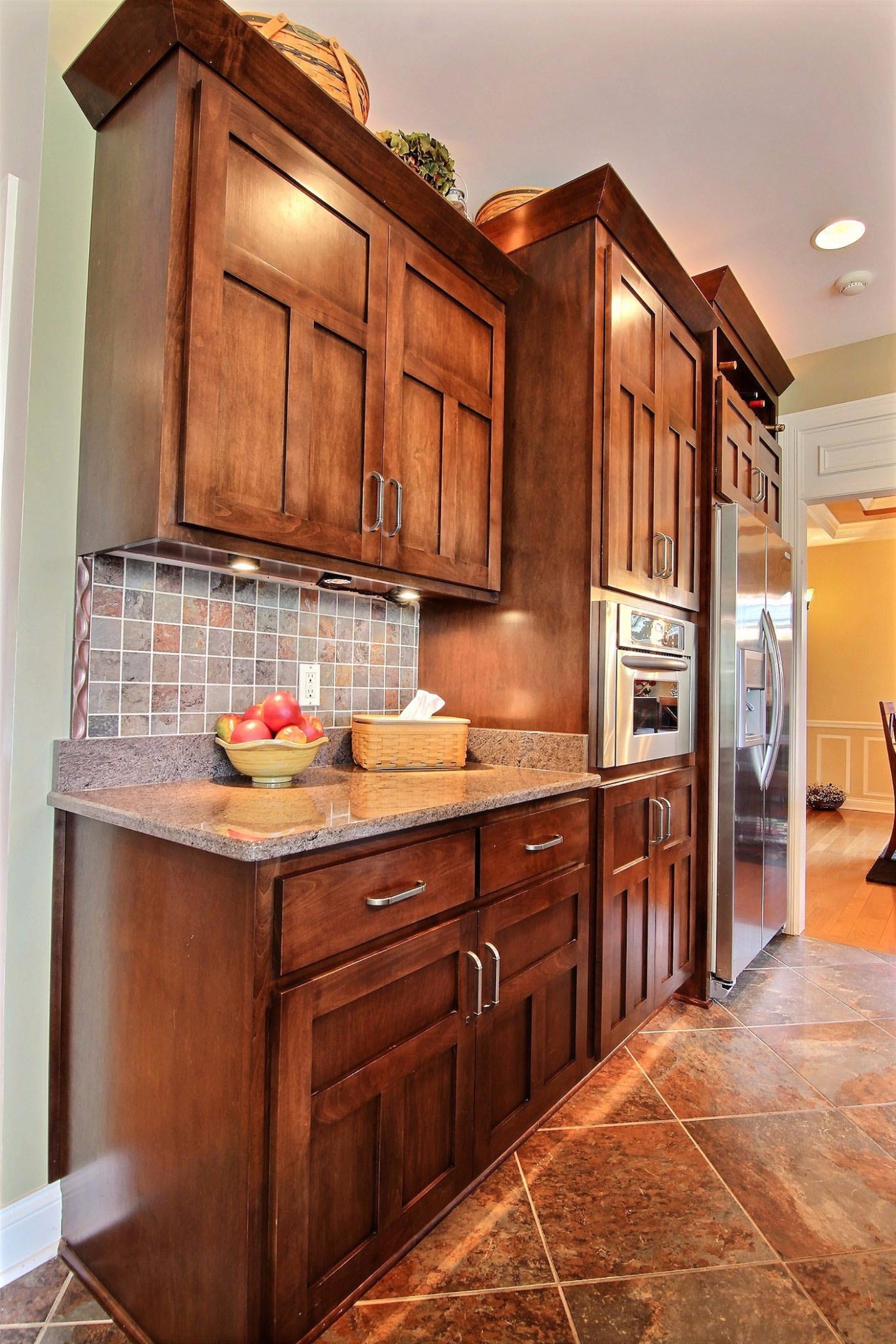 4930 West 100th Lane Crown Point, IN 46307 - Photo 10 of 10 a kitchen with stainless steel appliances granite countertop a sink and cabinets