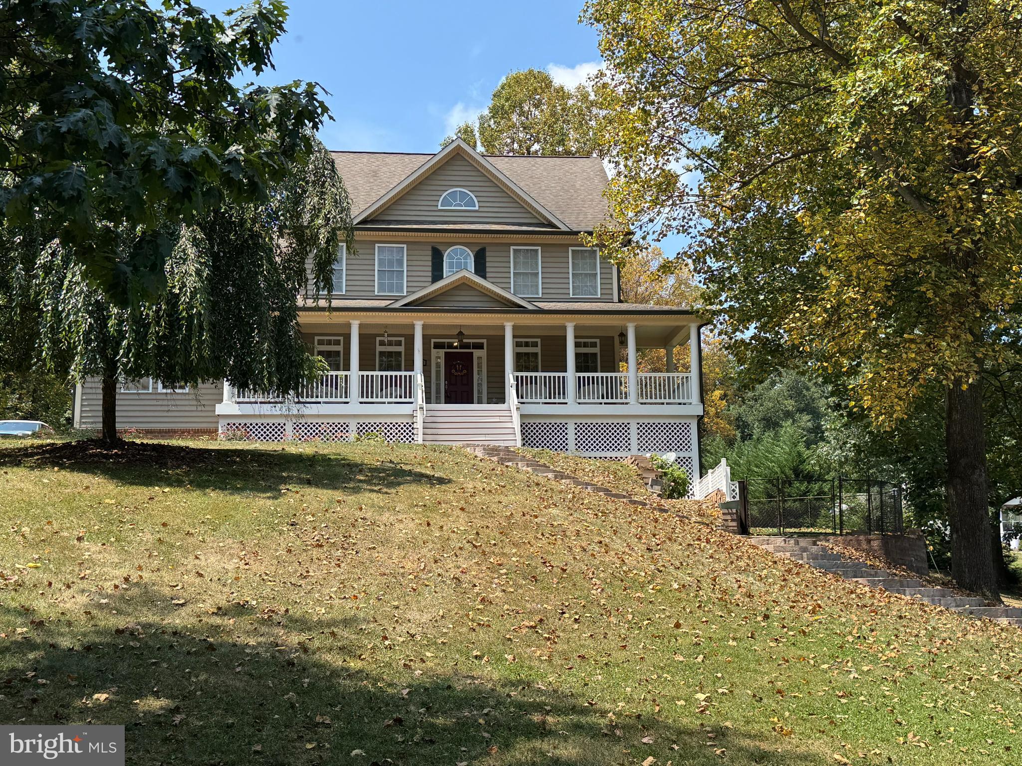 1670 Monument Road Middletown, MD 21769 - Photo 1 of 69 a front view of a house with a yard