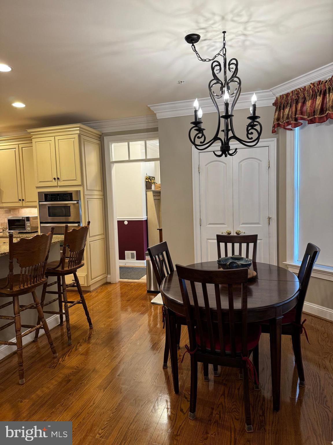 1670 Monument Road Middletown, MD 21769 - Photo 18 of 69 a view of a dining room with furniture window and wooden floor