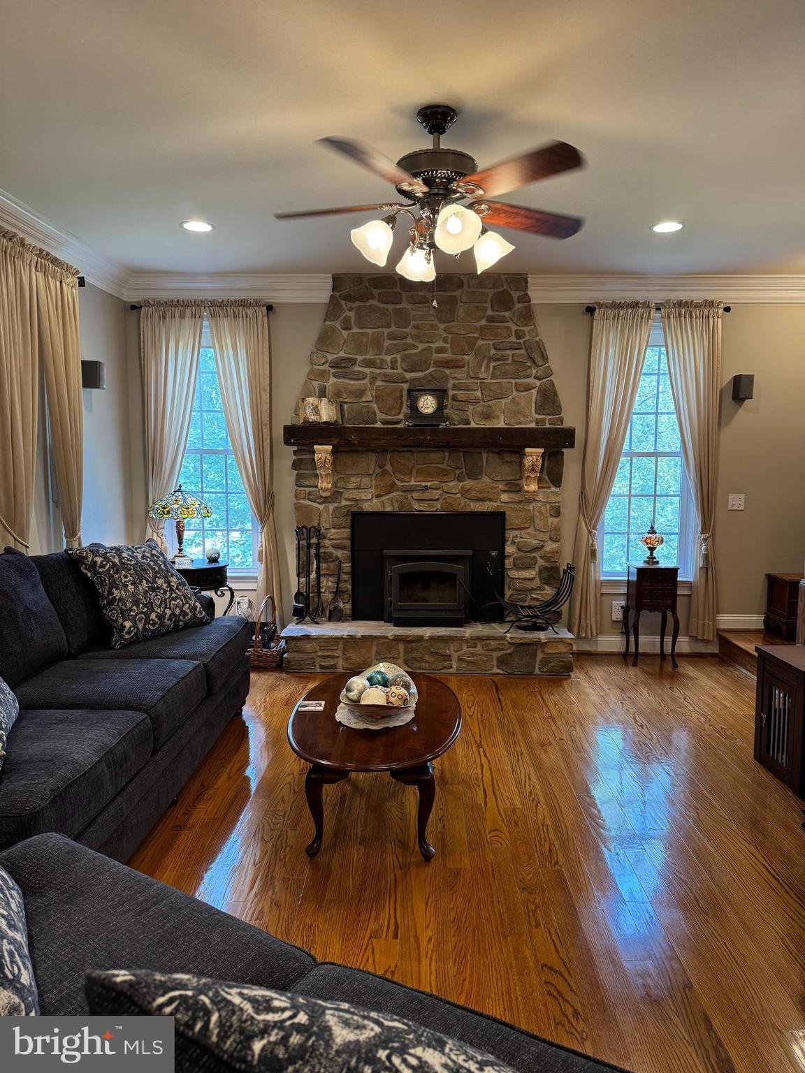 1670 Monument Road Middletown, MD 21769 - Photo 21 of 69 a living room with furniture and a fireplace