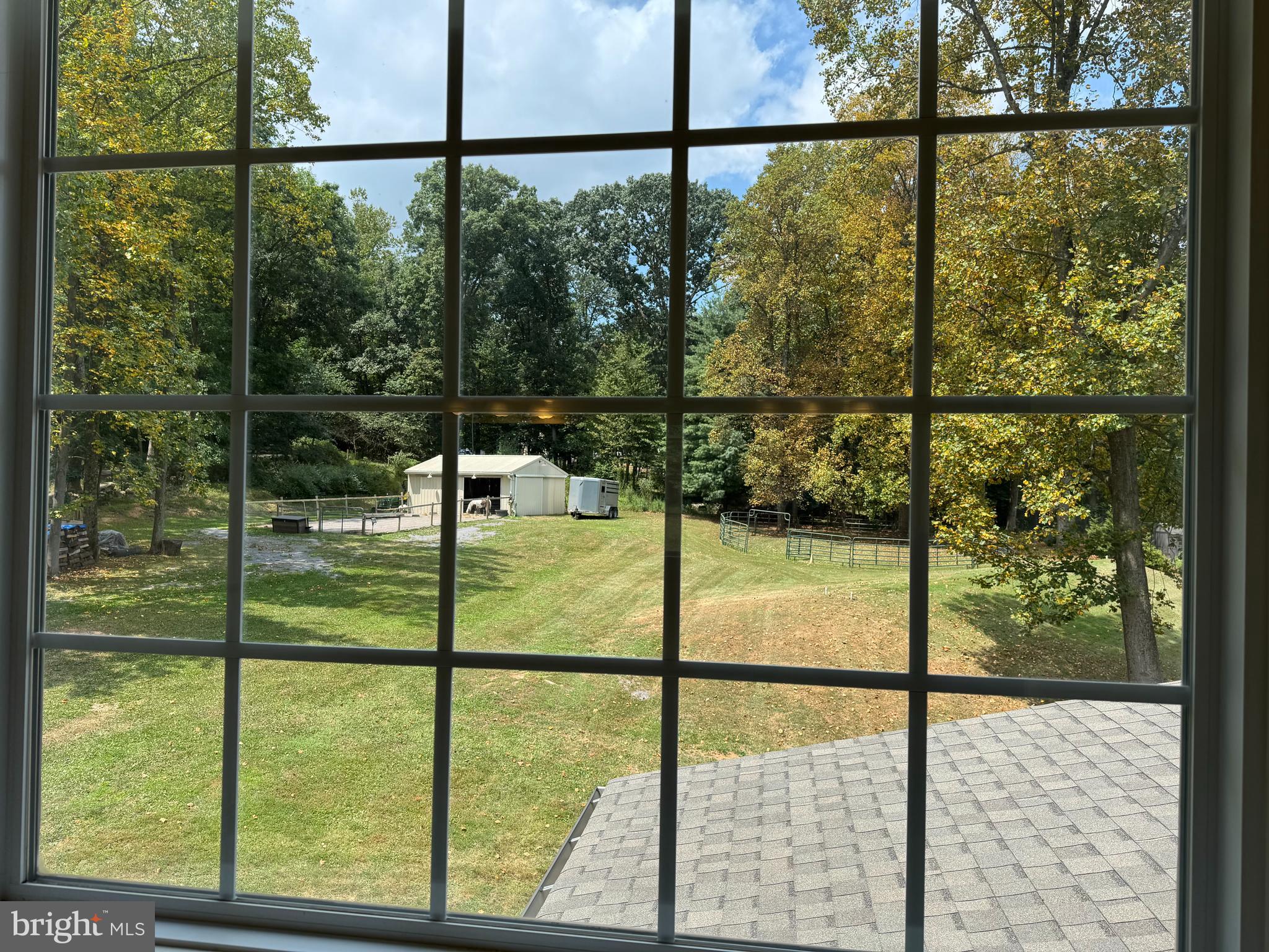 1670 Monument Road Middletown, MD 21769 - Photo 42 of 69 a view of a glass door with a floor to ceiling window