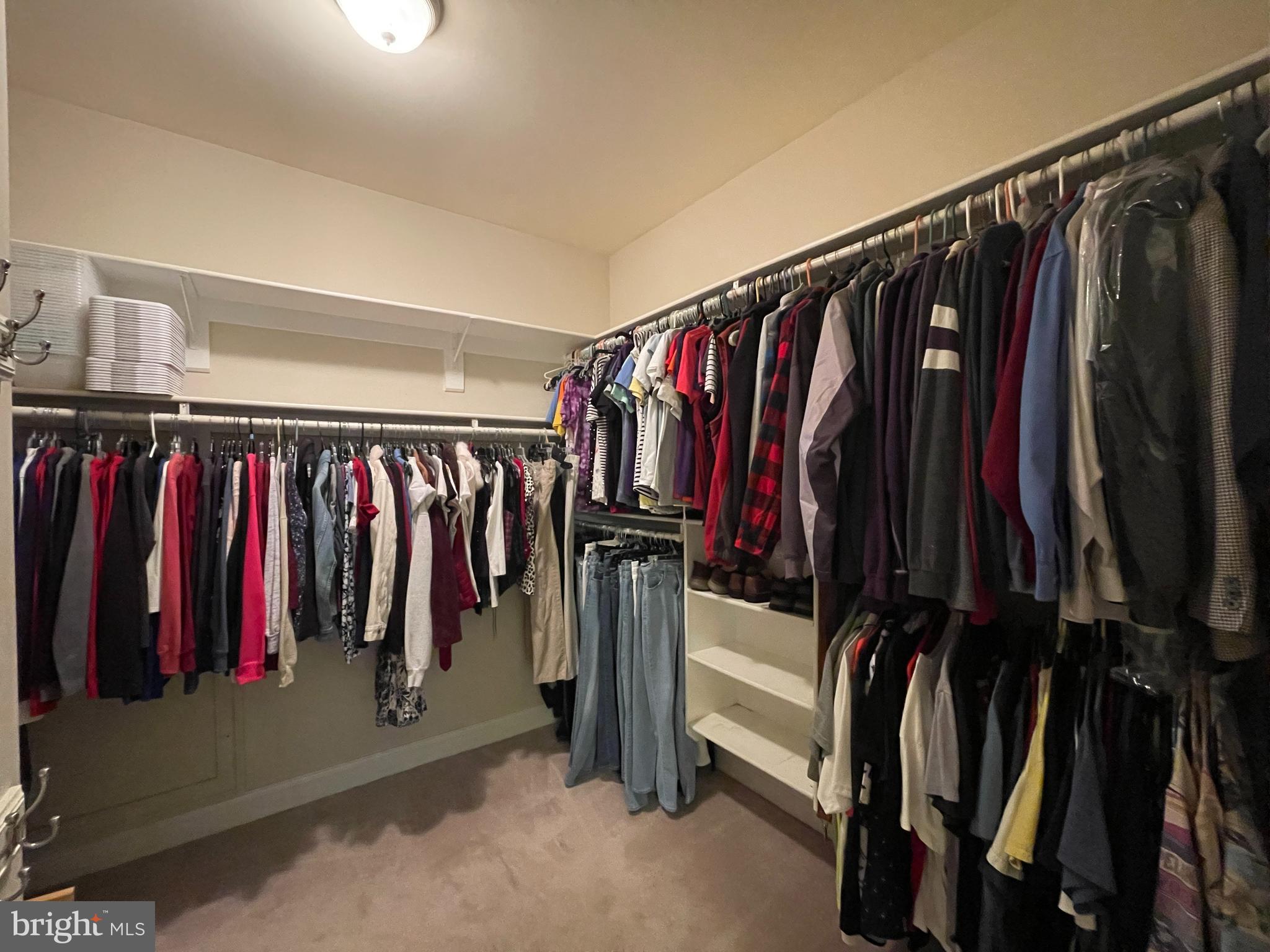1670 Monument Road Middletown, MD 21769 - Photo 46 of 69 a view of walk in closet with clothes and shoes