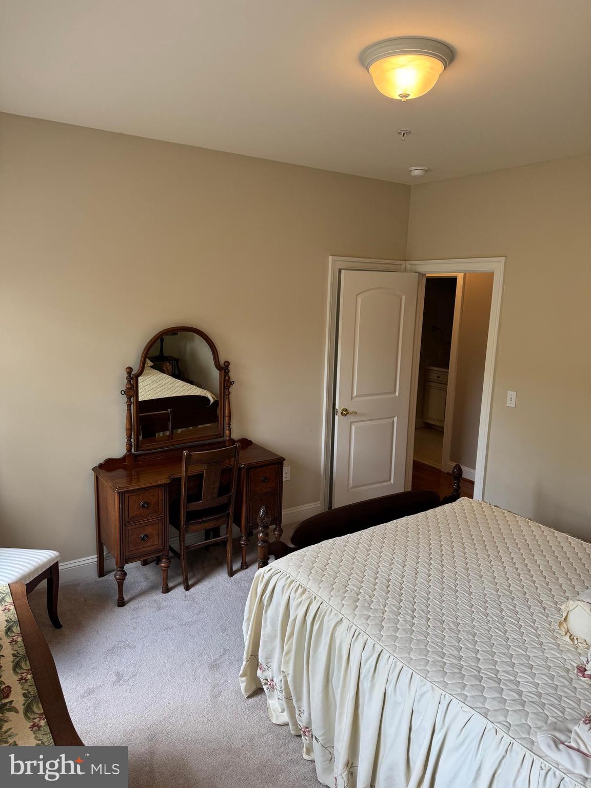 1670 Monument Road Middletown, MD 21769 - Photo 55 of 69 a bedroom with a bed and a chair