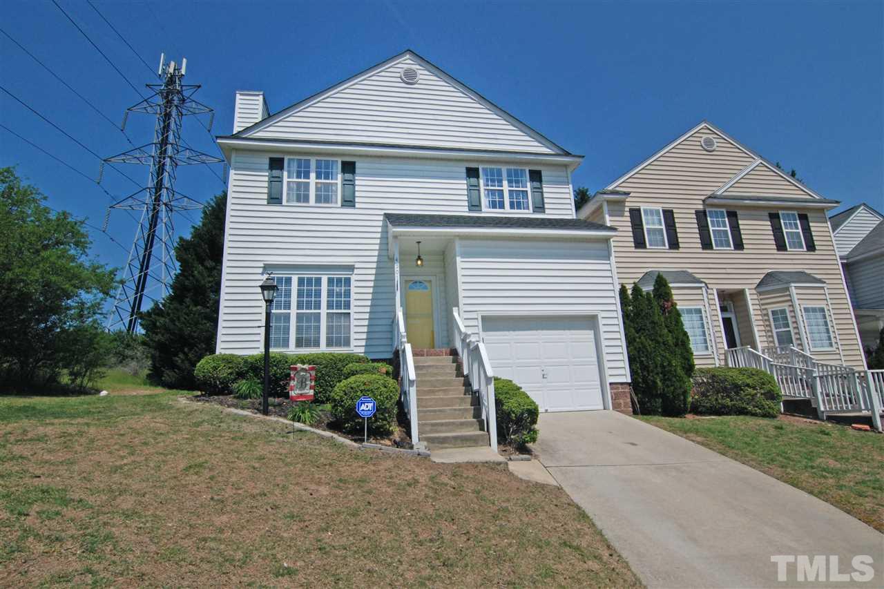 4501 Pinckney Place Raleigh, NC 27604 - Photo 2 of 22 a front view of a house with garden