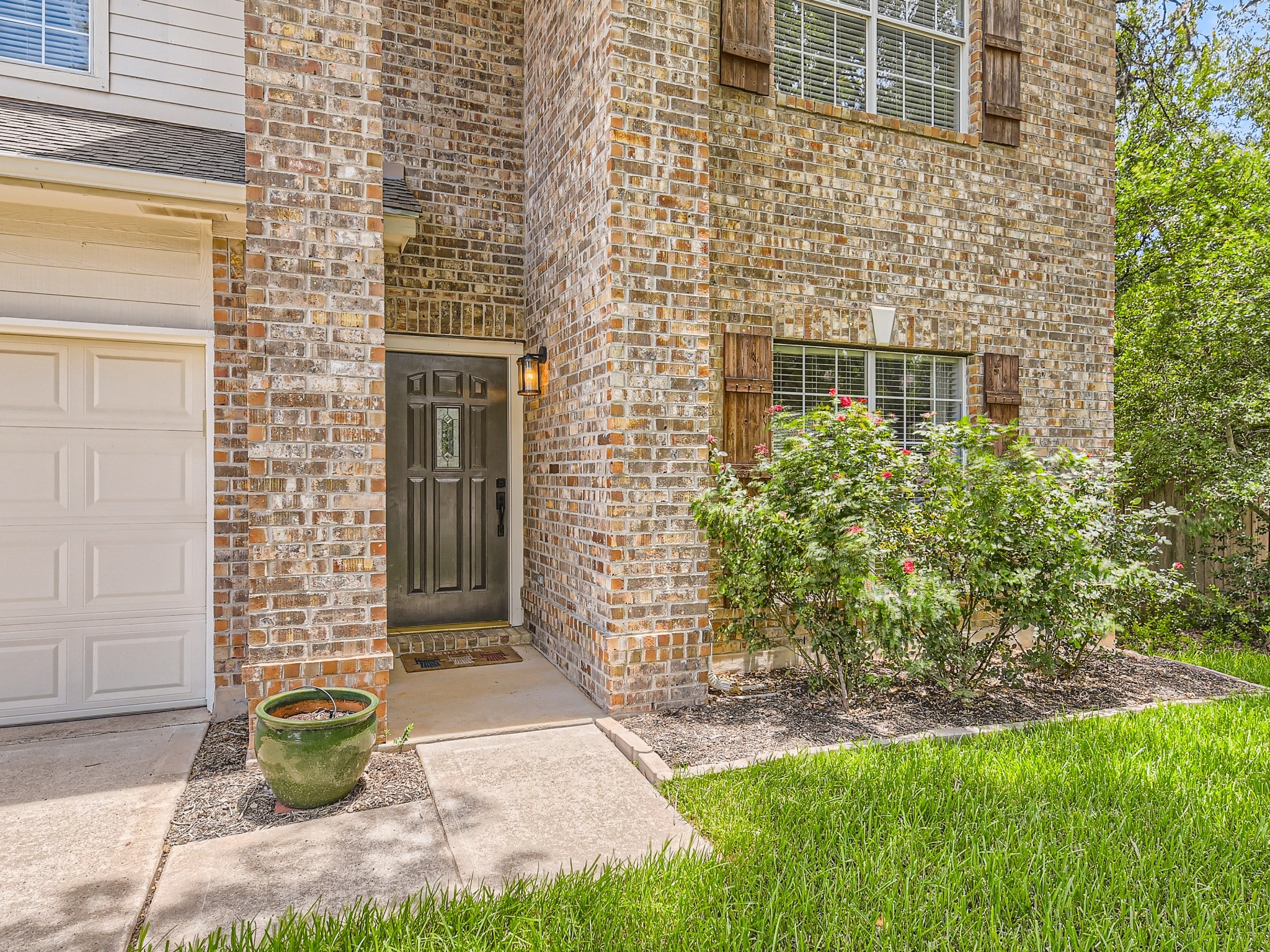 5904 Kabaye Cove Austin, TX 78749 - Photo 3 of 28 a front view of a house with garden