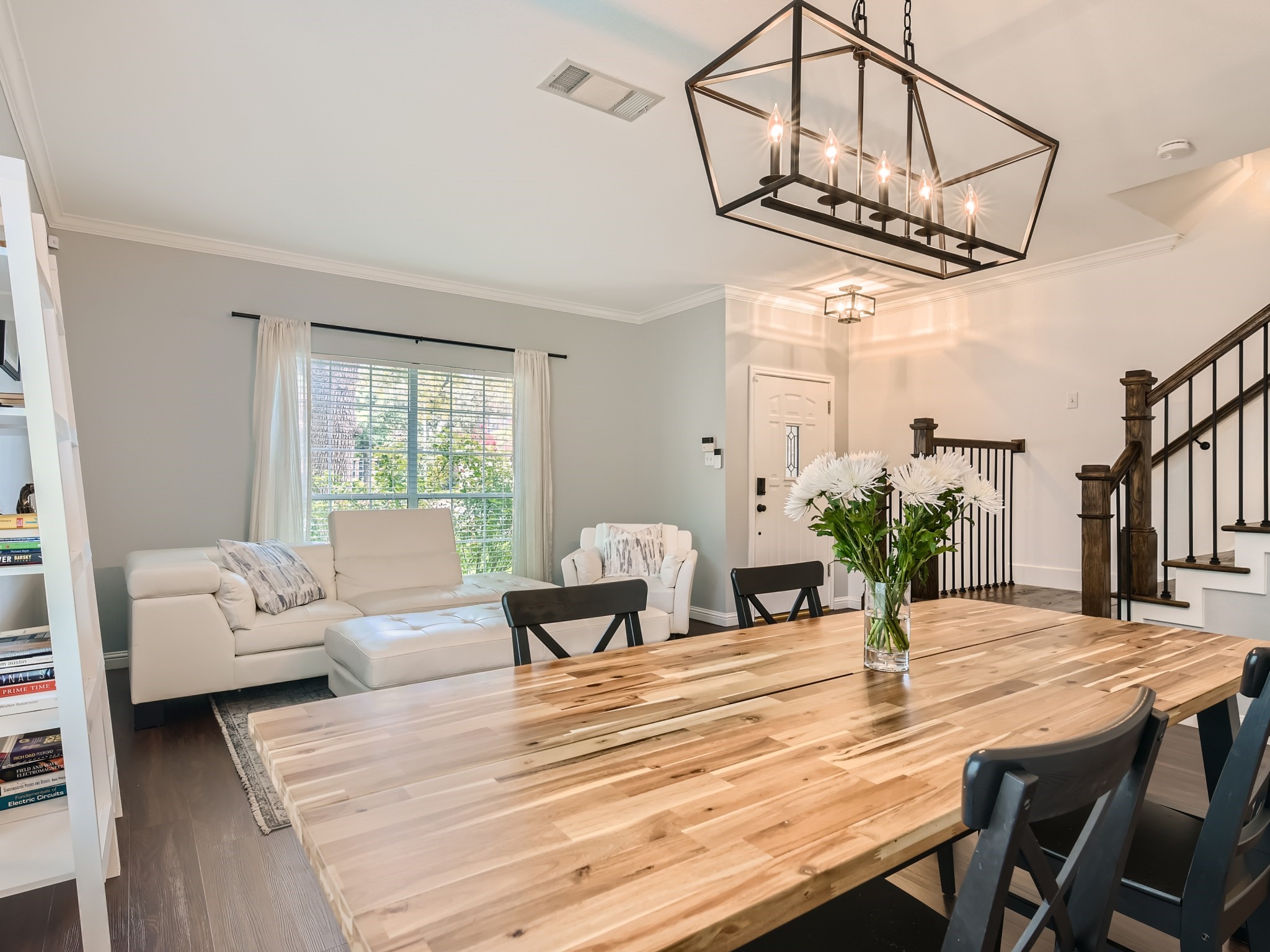 5904 Kabaye Cove Austin, TX 78749 - Photo 7 of 28 a view of a dining room with furniture window and wooden floor