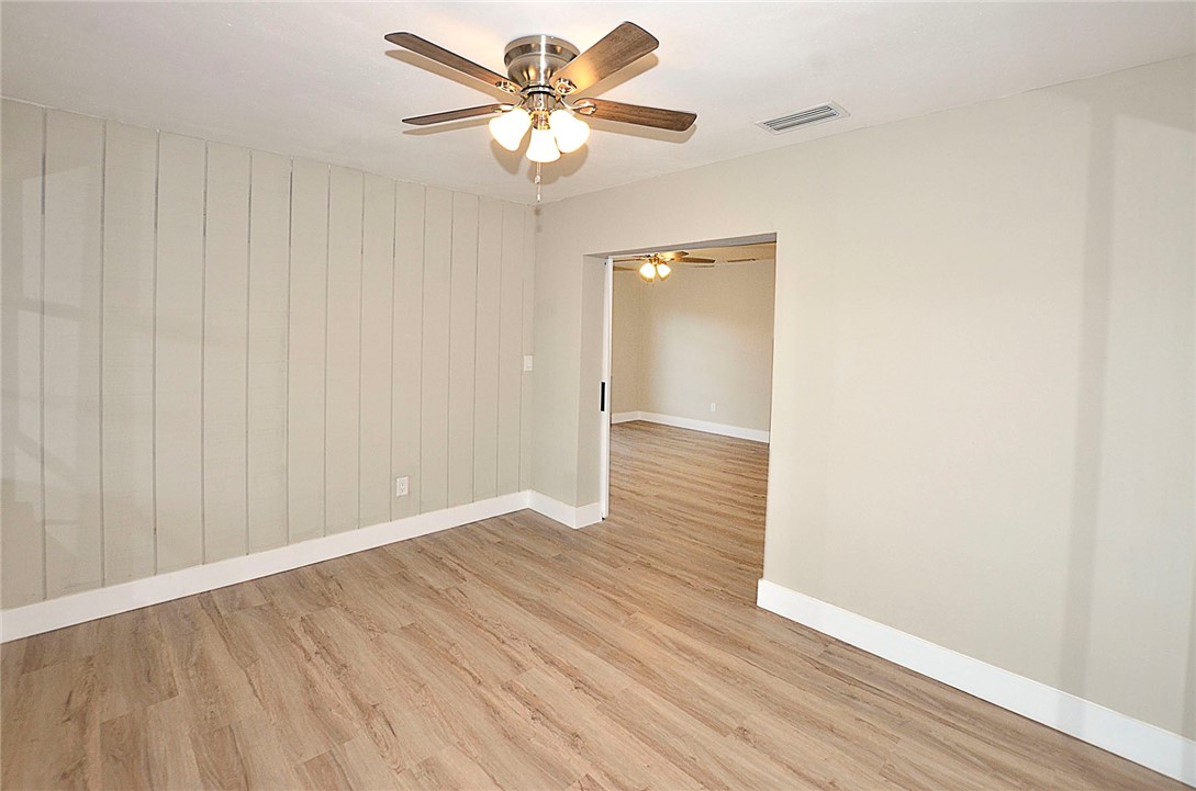 355 6th Road Southwest Vero Beach, FL 32962 - Photo 15 of 23 a view of an empty room with wooden floor
