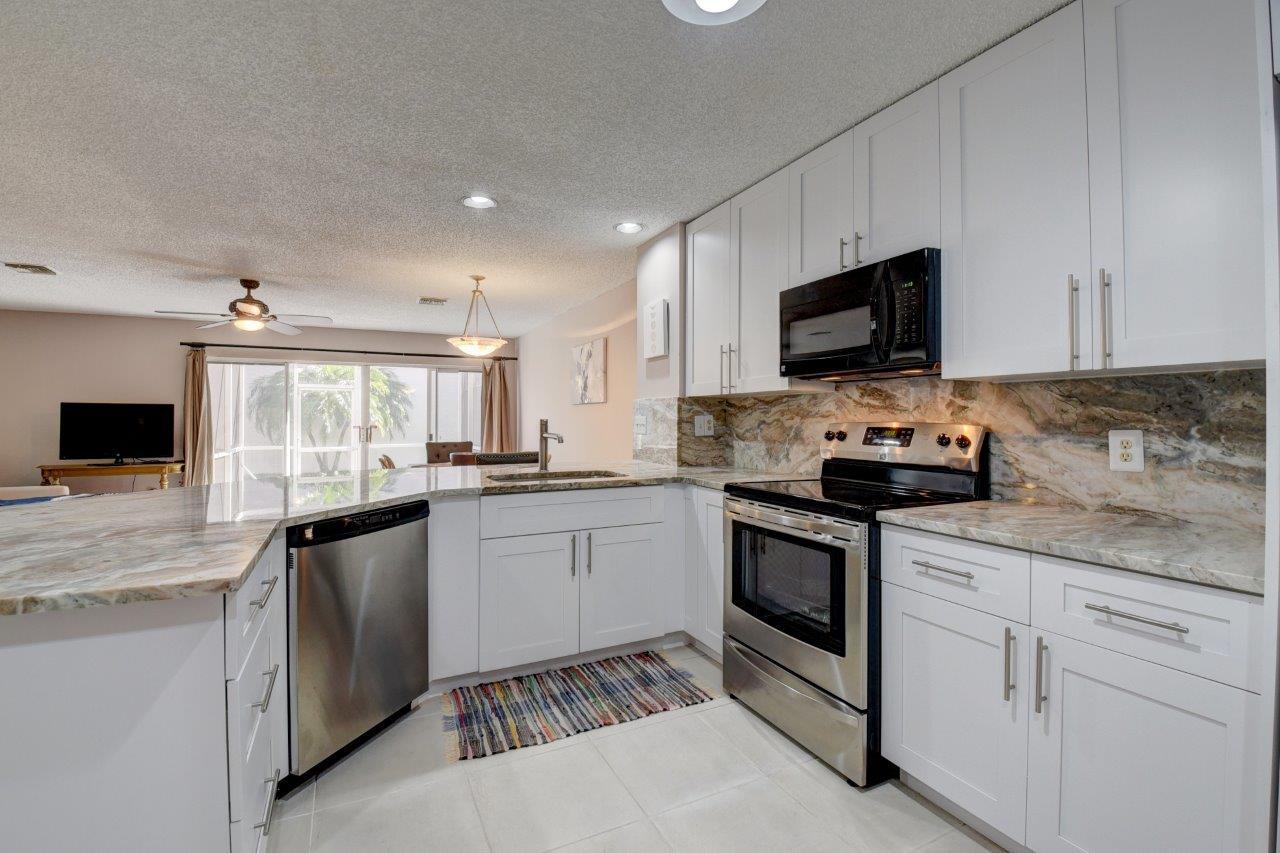 9517 Boca River Circle Boca Raton, FL 33434 - Photo 3 of 22 Kitchen Cont..