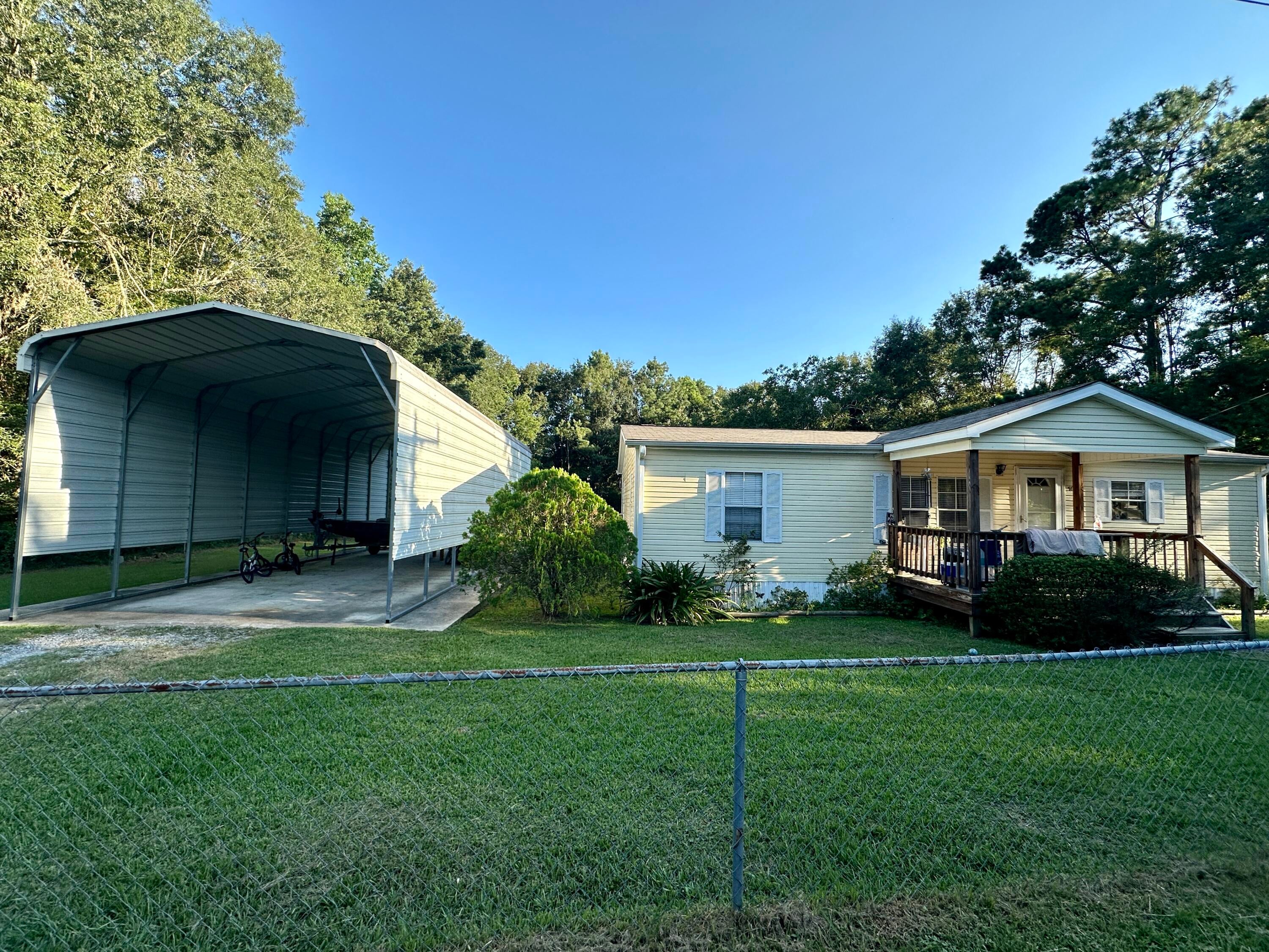5025 Annunciation Road Kiln, MS 39556 - Photo 1 of 1 Front View With RV Carport