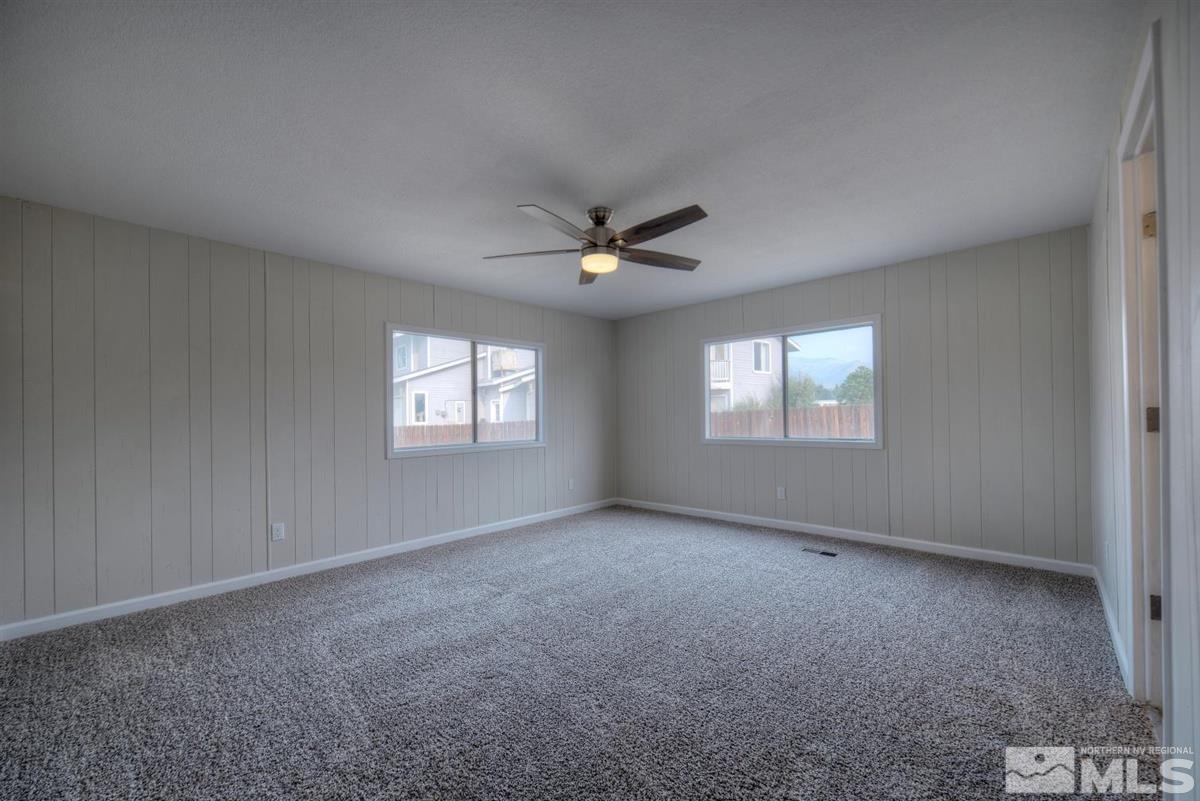 370 Scorpio Circle Reno, NV 89521 - Photo 11 of 25 a view of an empty room with a window