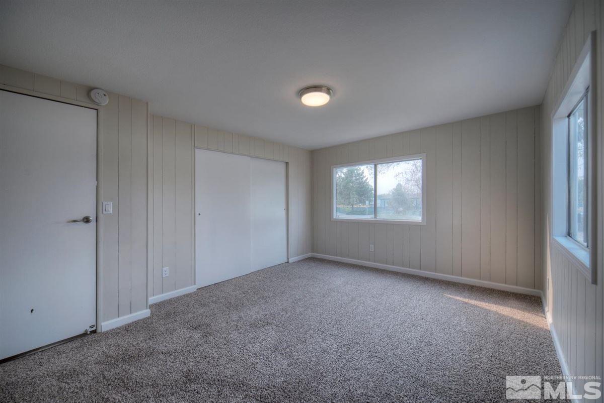 370 Scorpio Circle Reno, NV 89521 - Photo 20 of 25 a view of an empty room with windows