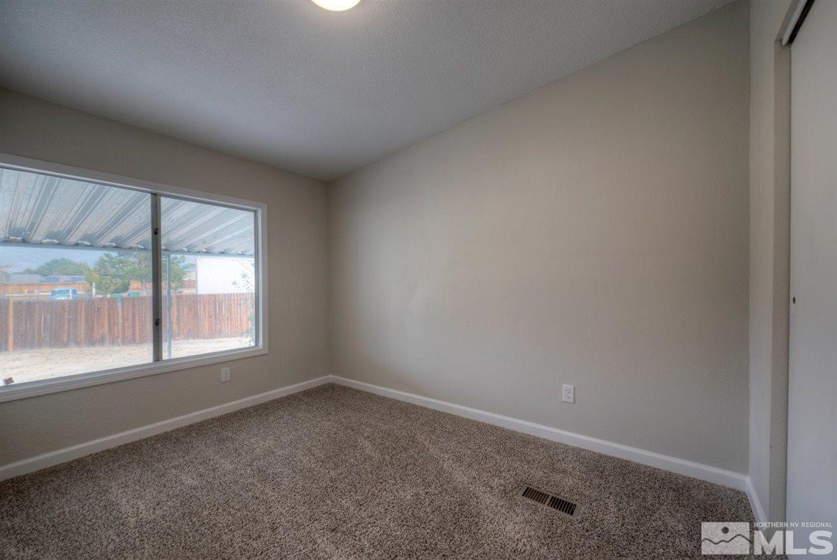 370 Scorpio Circle Reno, NV 89521 - Photo 21 of 25 an empty room with a window