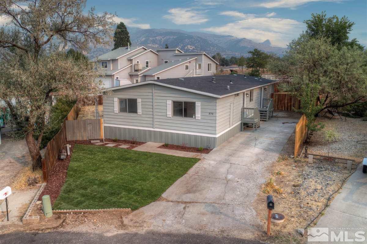 370 Scorpio Circle Reno, NV 89521 - Photo 22 of 25 front view of a house with a yard