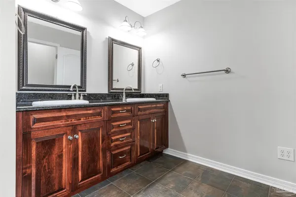 a view of a sink and a mirror