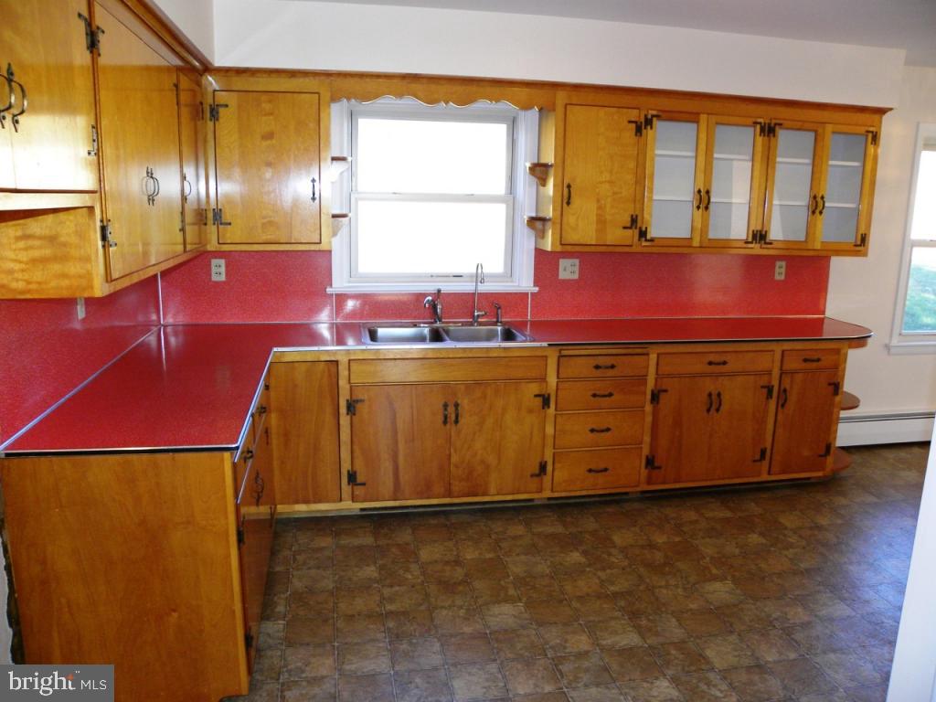 1524 Mountain Road Manheim, PA 17545 - Photo 11 of 17 a kitchen with stainless steel appliances granite countertop a sink and a cabinets