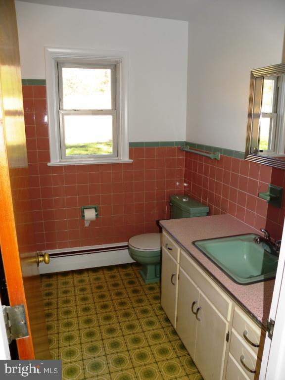 1524 Mountain Road Manheim, PA 17545 - Photo 15 of 17 a bathroom with a sink and a toilet
