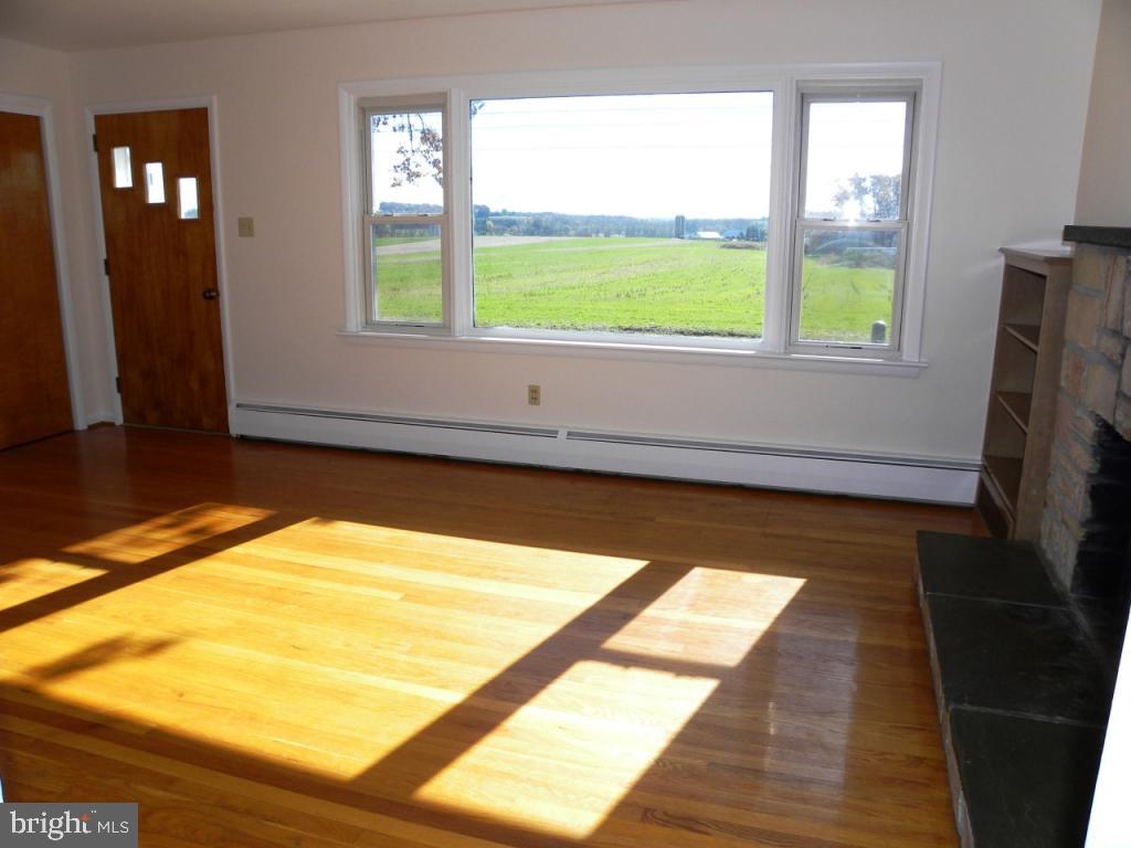 1524 Mountain Road Manheim, PA 17545 - Photo 8 of 17 a view of an empty room and window