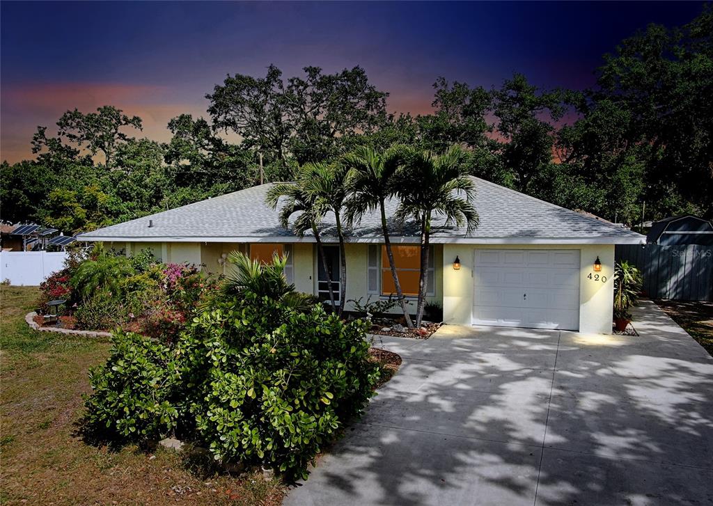 420 Zephyr Road Venice, FL 34293 - Photo 1 of 1 a front view of a house with a yard