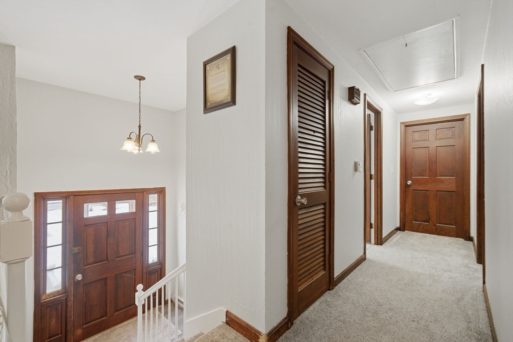 14 Seabrook Road Salisbury, MA 01952 - Photo 11 of 30 a view of a hallway with bathroom and wooden floor