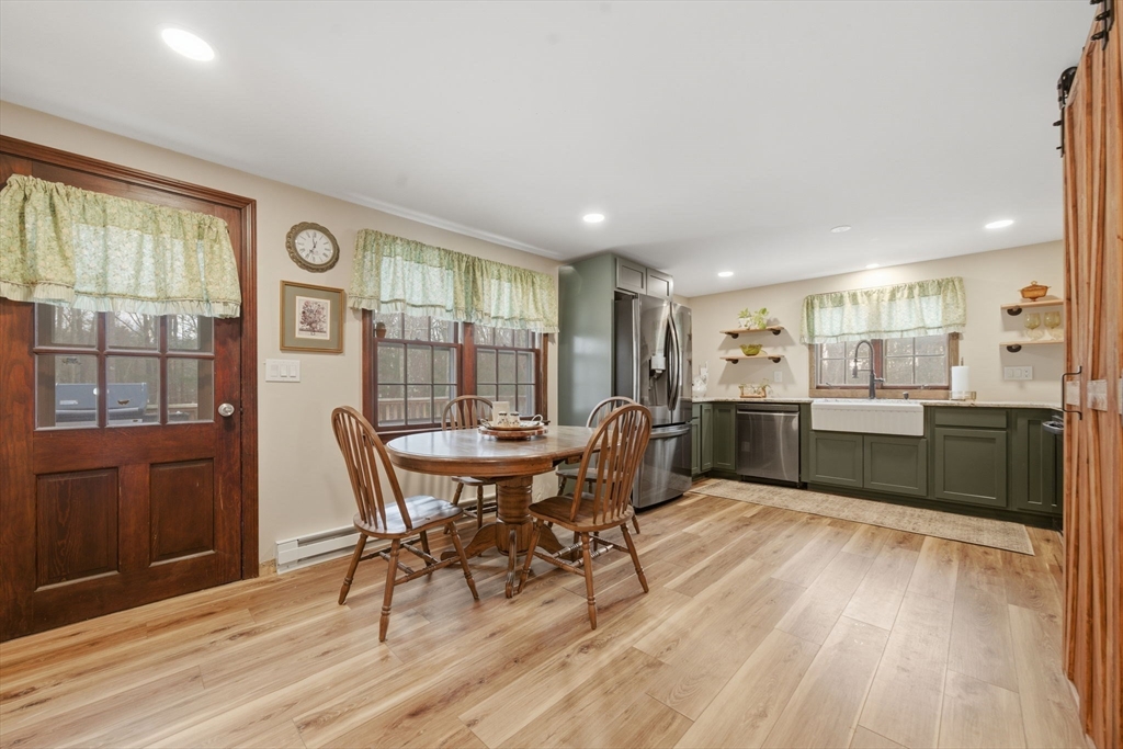 14 Seabrook Road Salisbury, MA 01952 - Photo 6 of 30 a view of a dining room with furniture and wooden floor