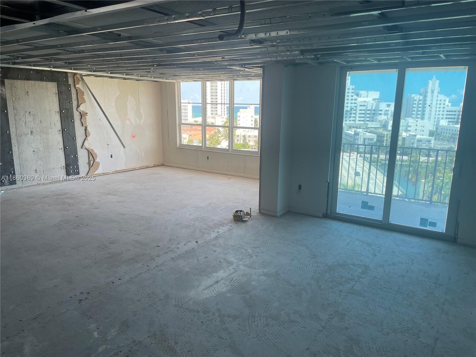 4101 Pine Tree Drive, Unit 926 925 Miami Beach, FL 33140 - Photo 12 of 12 a view of an empty room with a window