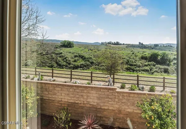 a spacious bathroom with a double vanity sink a mirror and a shower