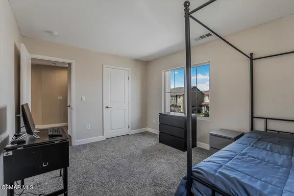 a bathroom with a sink double vanity and a mirror