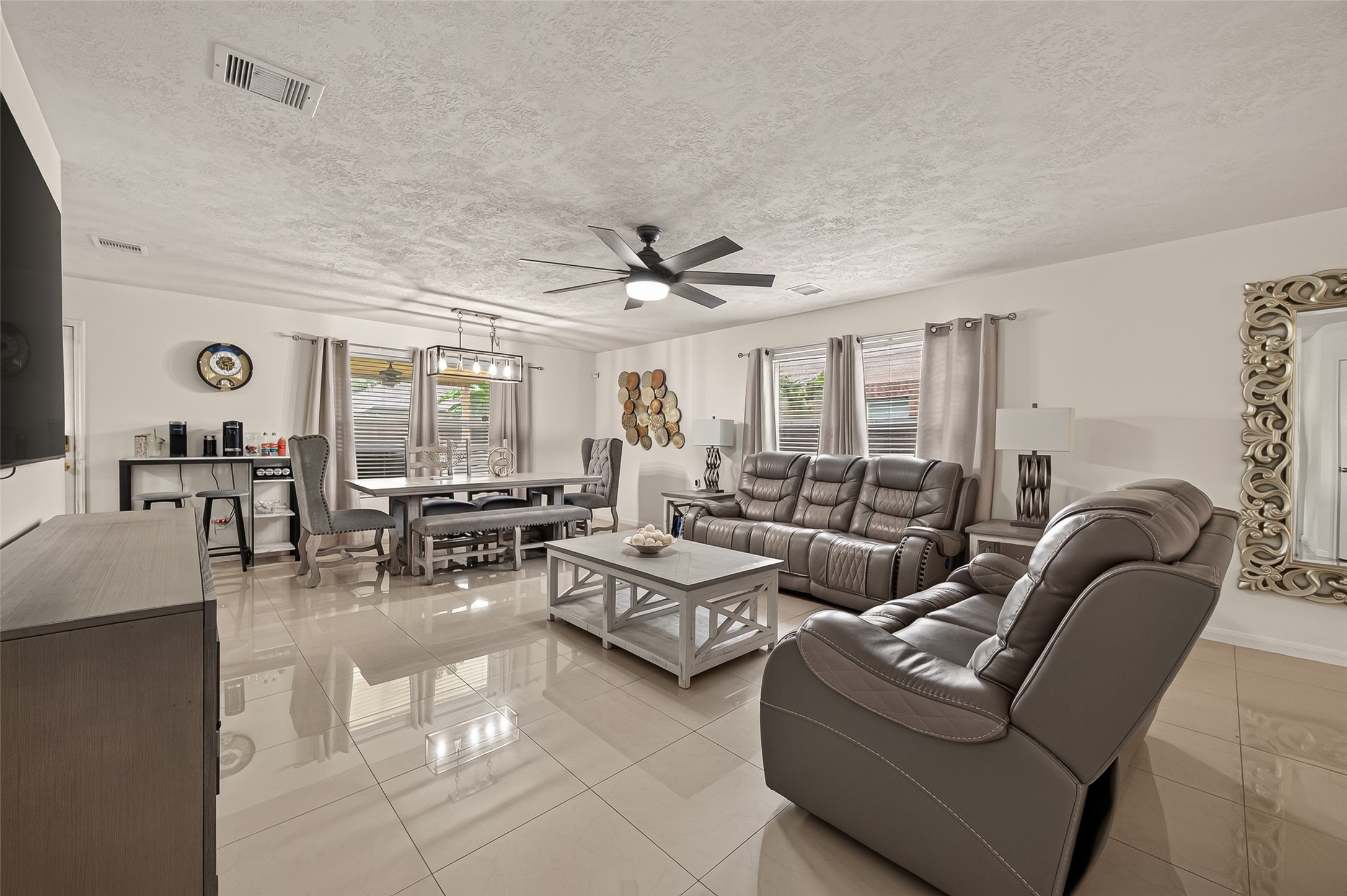 10931 View Pointe Lane Houston, TX 77034 - Photo 4 of 21 Living/Dinning combo very spacious with tile floors