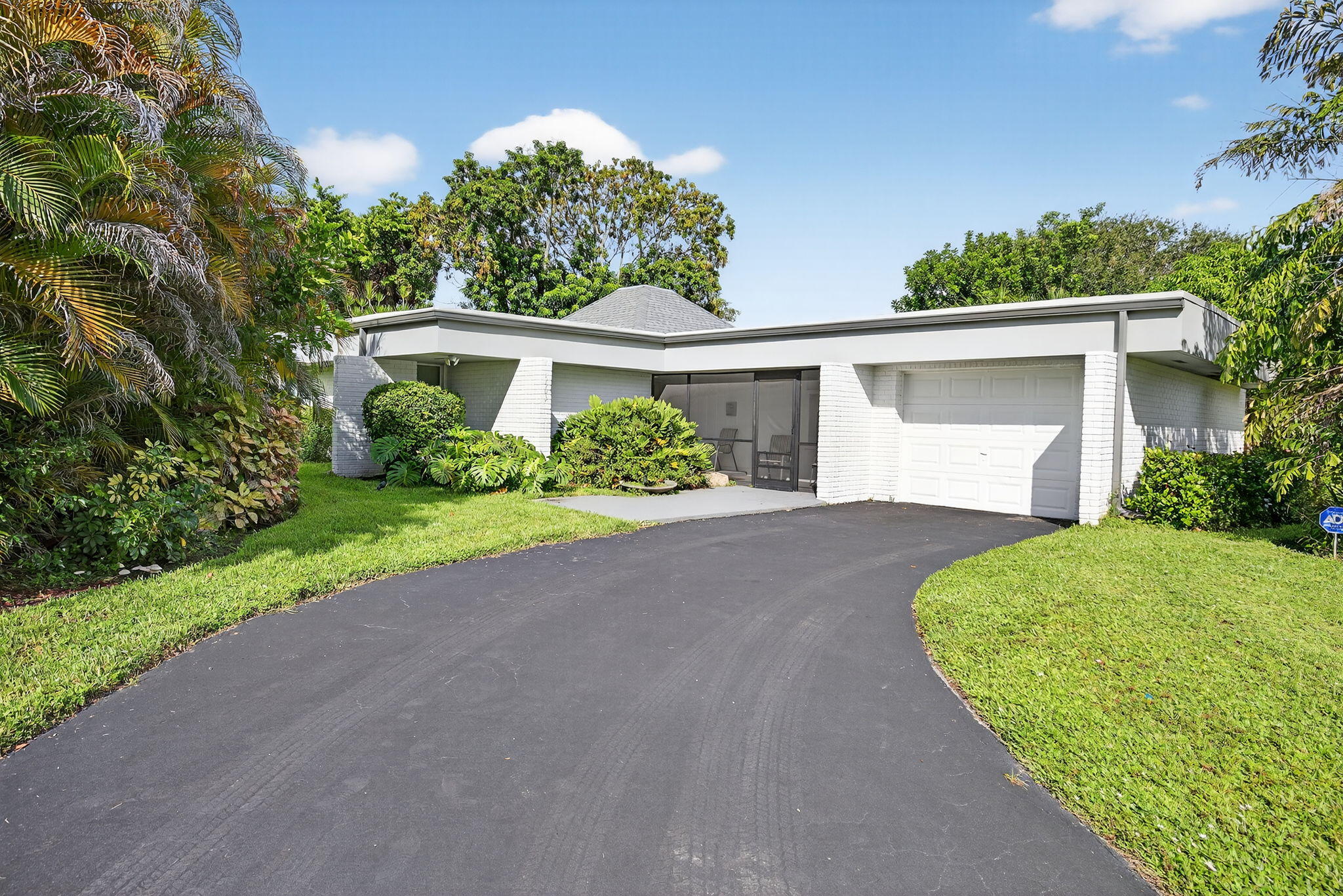 5503 Bluejack Oak Circle Tamarac, FL 33319 - Photo 1 of 35 a view of a house with a yard