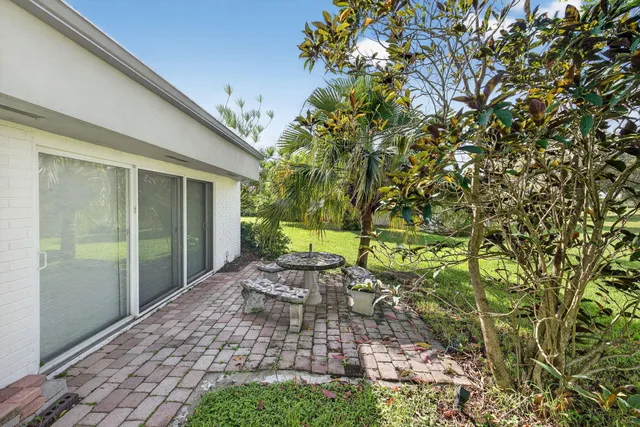 a view of a back yard of the house