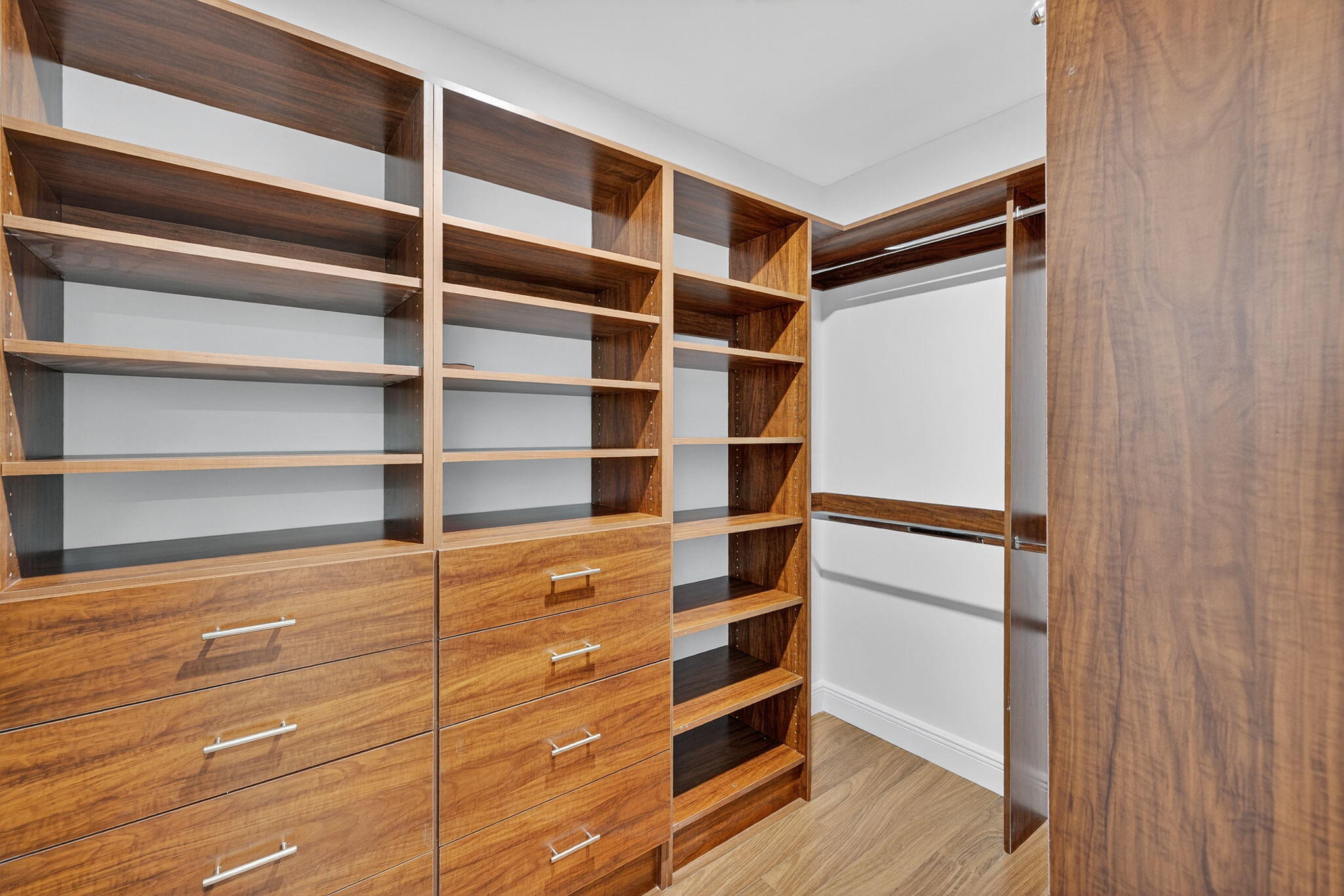 5503 Bluejack Oak Circle Tamarac, FL 33319 - Photo 20 of 35 a view of walk in closet with empty racks