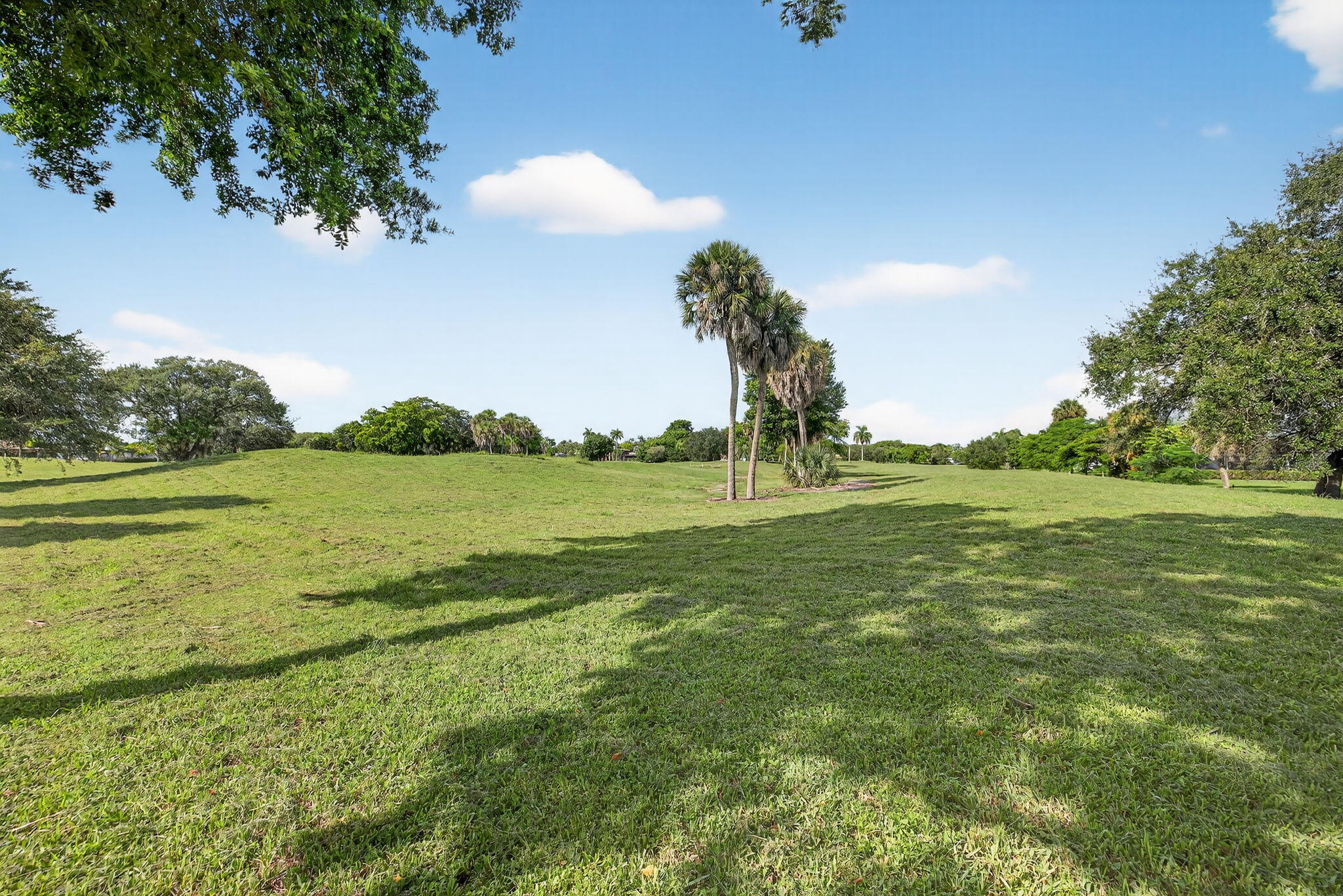 5503 Bluejack Oak Circle Tamarac, FL 33319 - Photo 3 of 35 a view of a field with an ocean