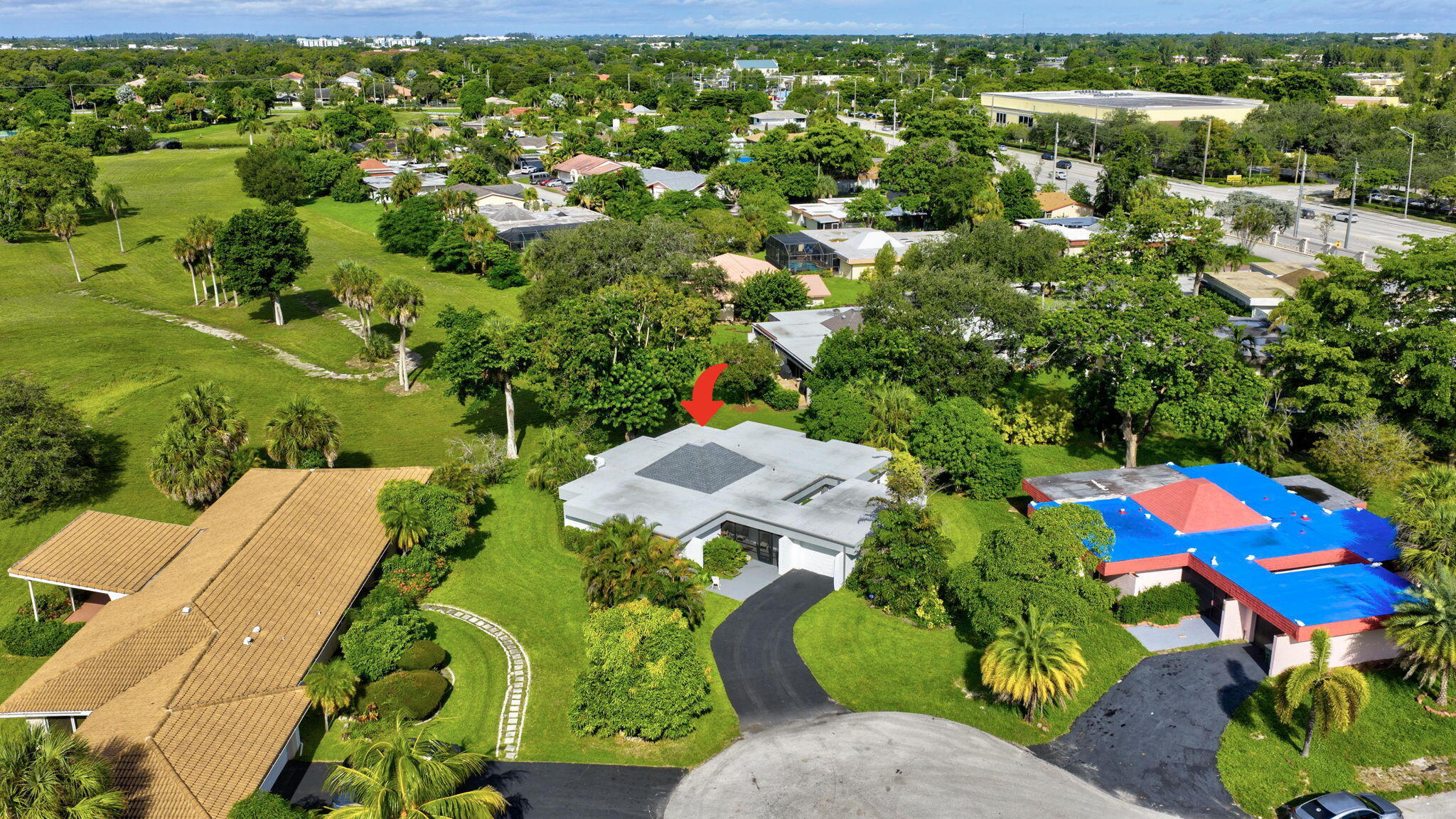 5503 Bluejack Oak Circle Tamarac, FL 33319 - Photo 32 of 35 an aerial view of a house with a yard and lake view
