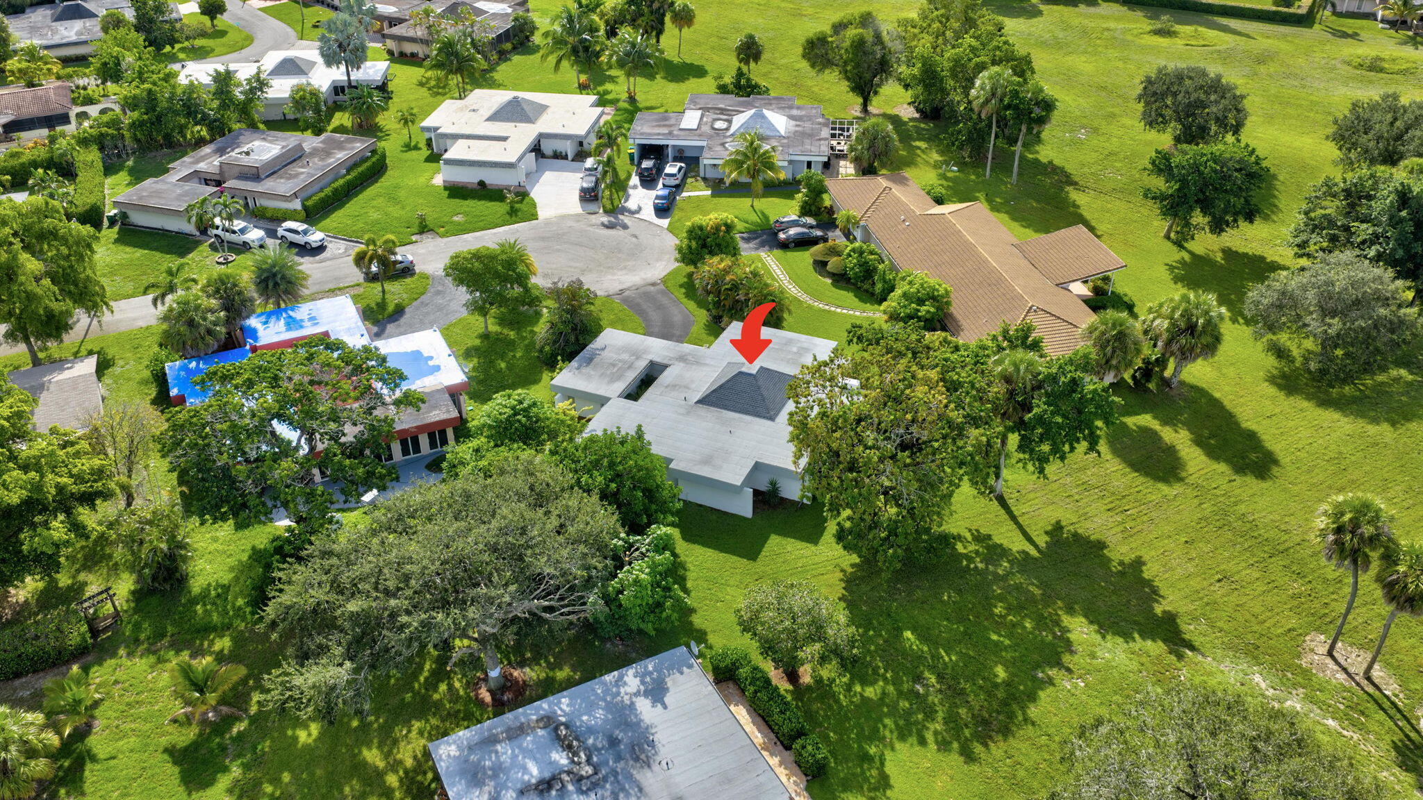 5503 Bluejack Oak Circle Tamarac, FL 33319 - Photo 34 of 35 an aerial view of residential houses with outdoor space and trees all around