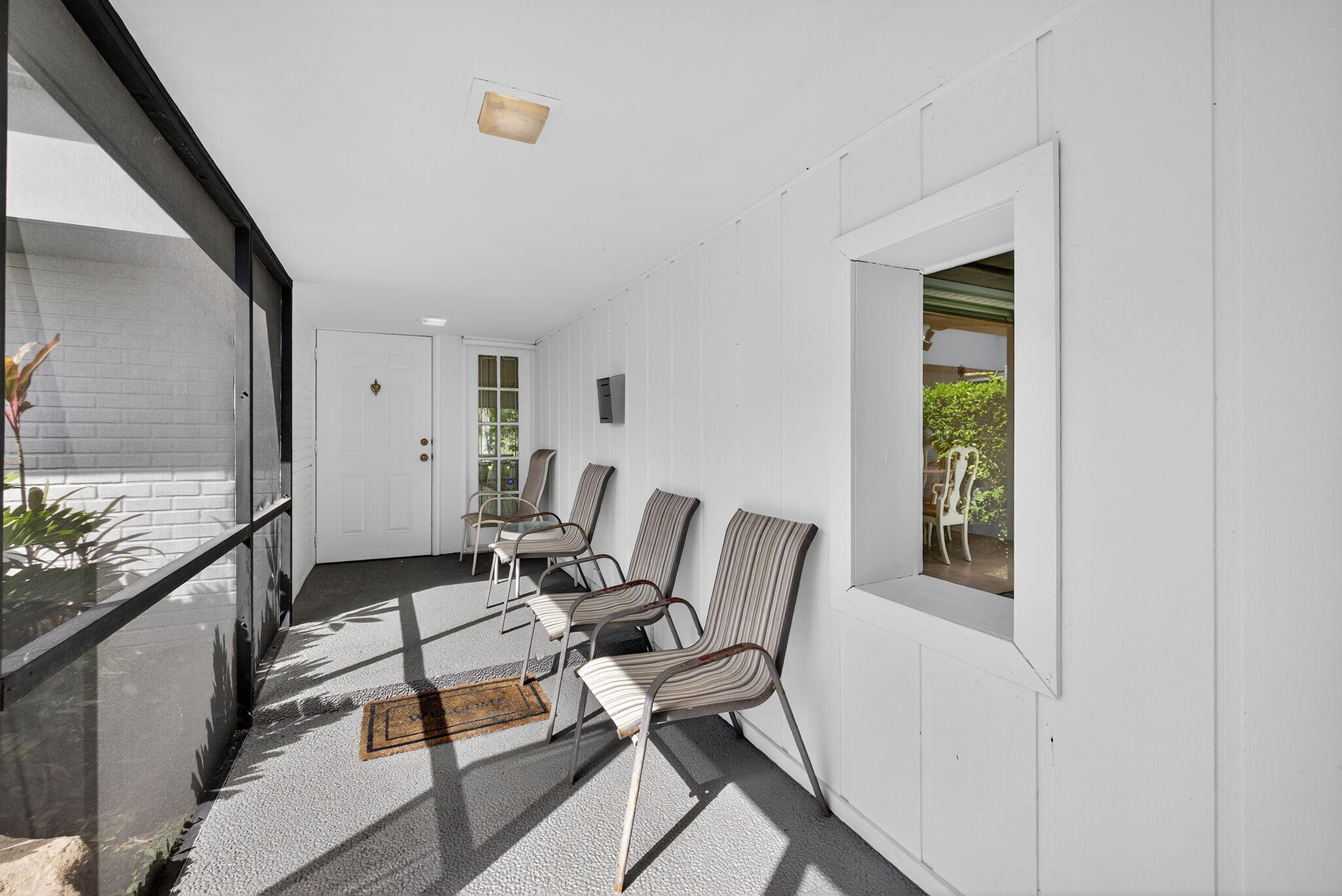5503 Bluejack Oak Circle Tamarac, FL 33319 - Photo 5 of 35 a living room with furniture and a window