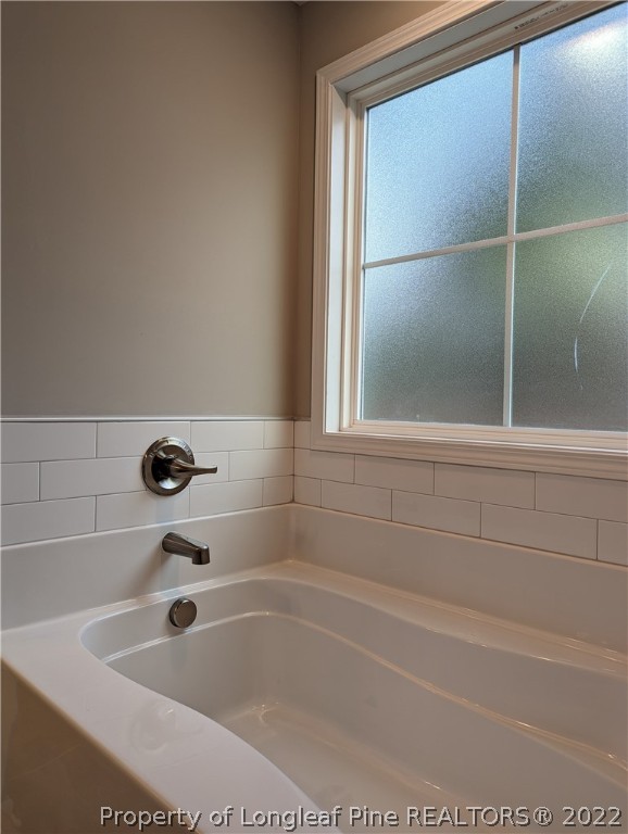 433 B & B Loop Road Raeford, NC 28376 - Photo 13 of 37 a bathroom with bathtub