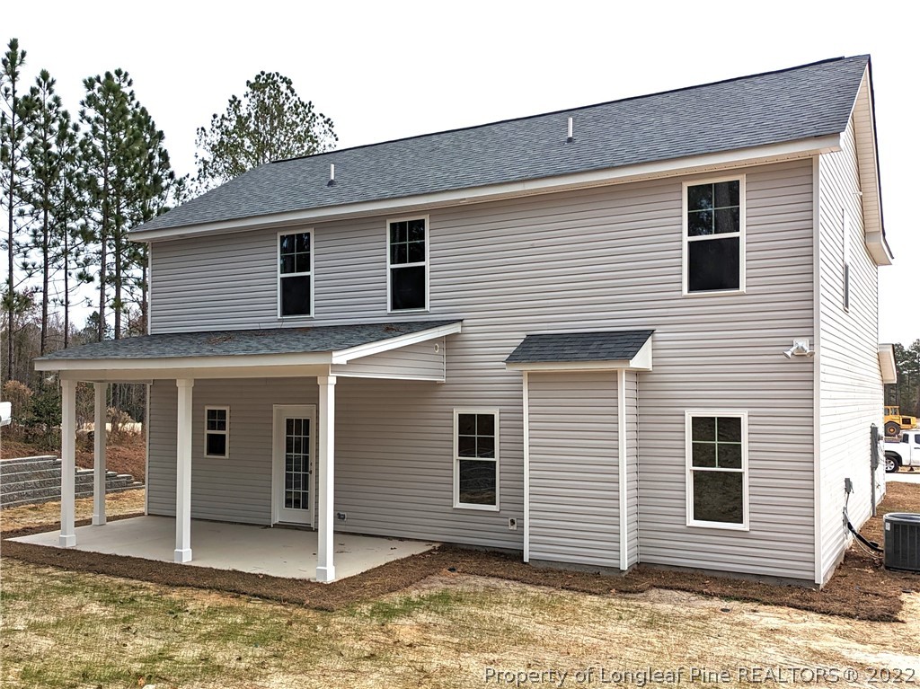 433 B & B Loop Road Raeford, NC 28376 - Photo 24 of 37 a view of a house with a yard