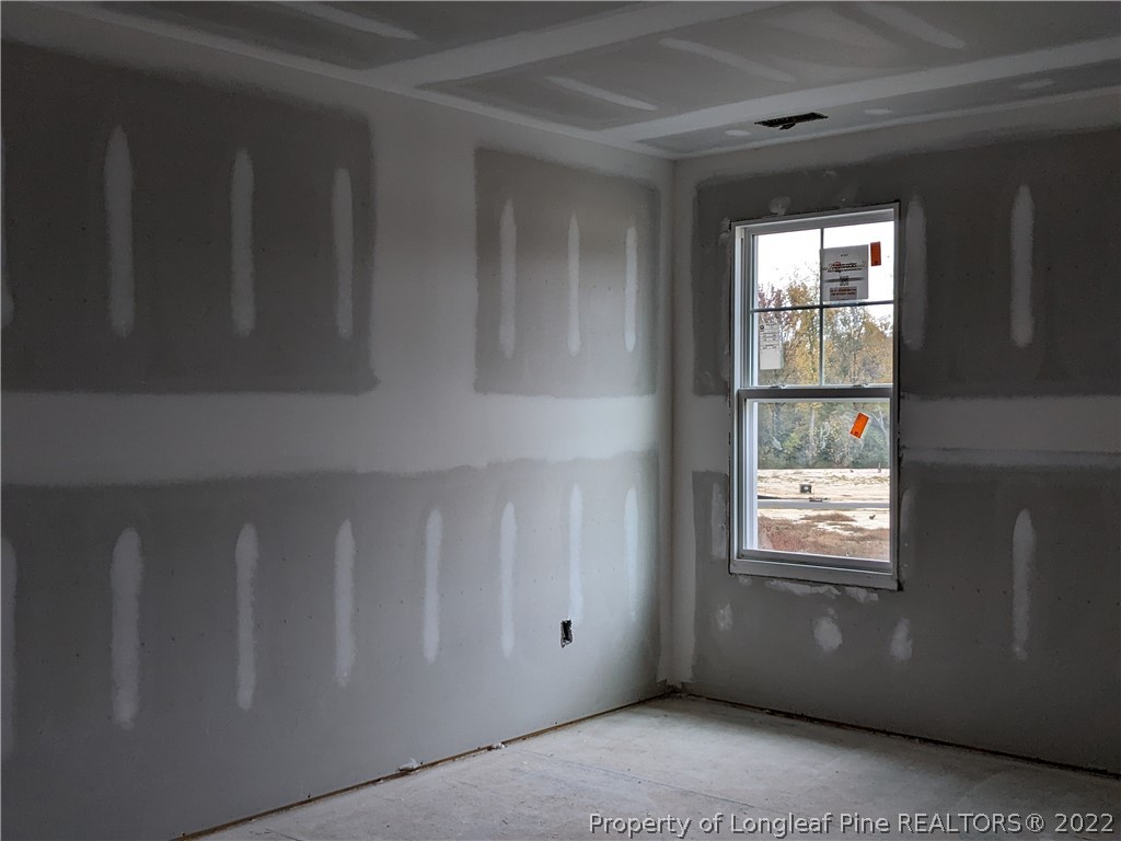 433 B & B Loop Road Raeford, NC 28376 - Photo 32 of 37 a view of an empty room with a window