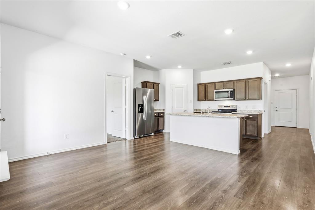3006 Pitchfork Way Forney, TX 75126 - Photo 10 of 34 Large open kitchen