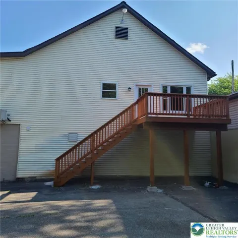 a view of balcony with furniture