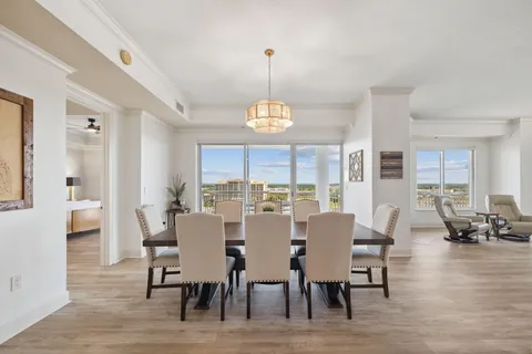 a large kitchen with stainless steel appliances lots of counter space and breakfast area