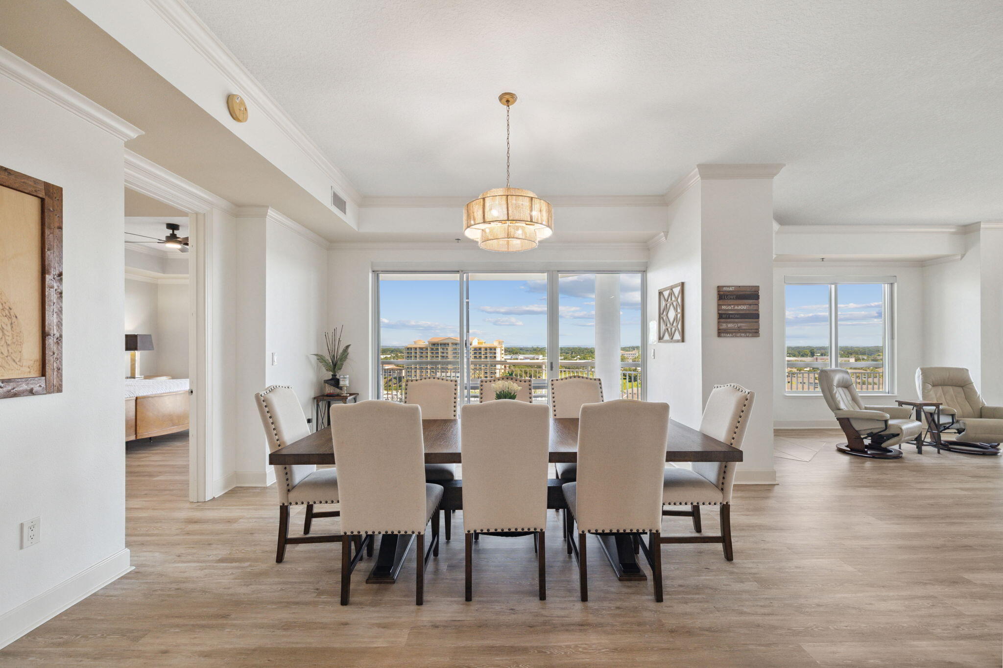 725 Gulf Shore Drive, Unit 902A Destin, FL 32541 - Photo 11 of 102 a view of a dining room with furniture window and wooden floor