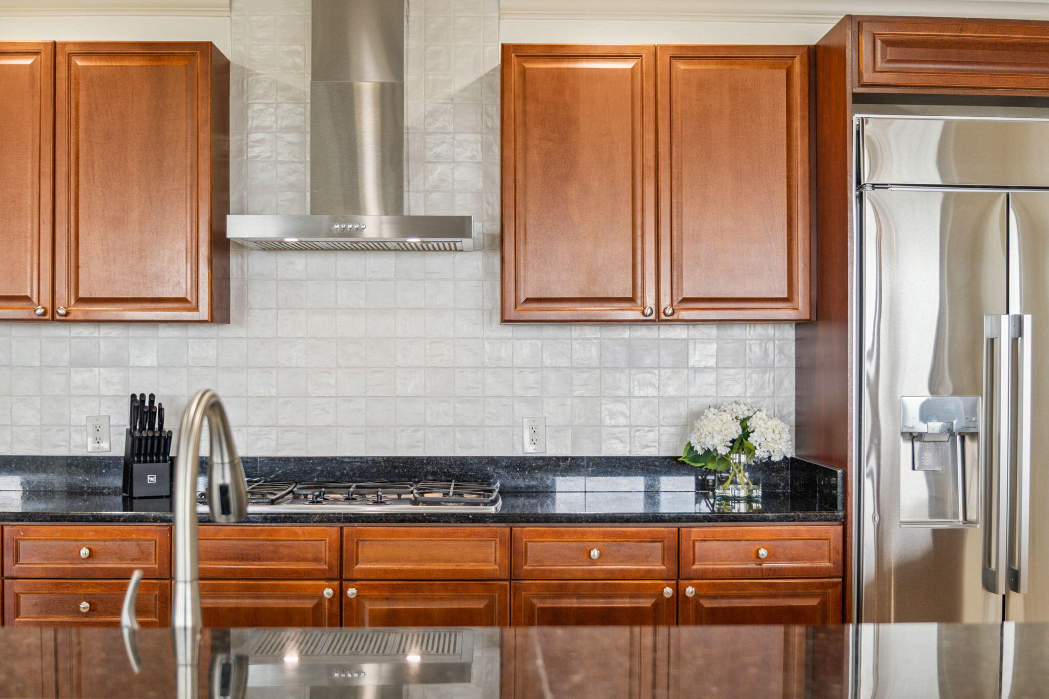 725 Gulf Shore Drive, Unit 902A Destin, FL 32541 - Photo 17 of 102 a kitchen with stainless steel appliances granite countertop a refrigerator and a sink