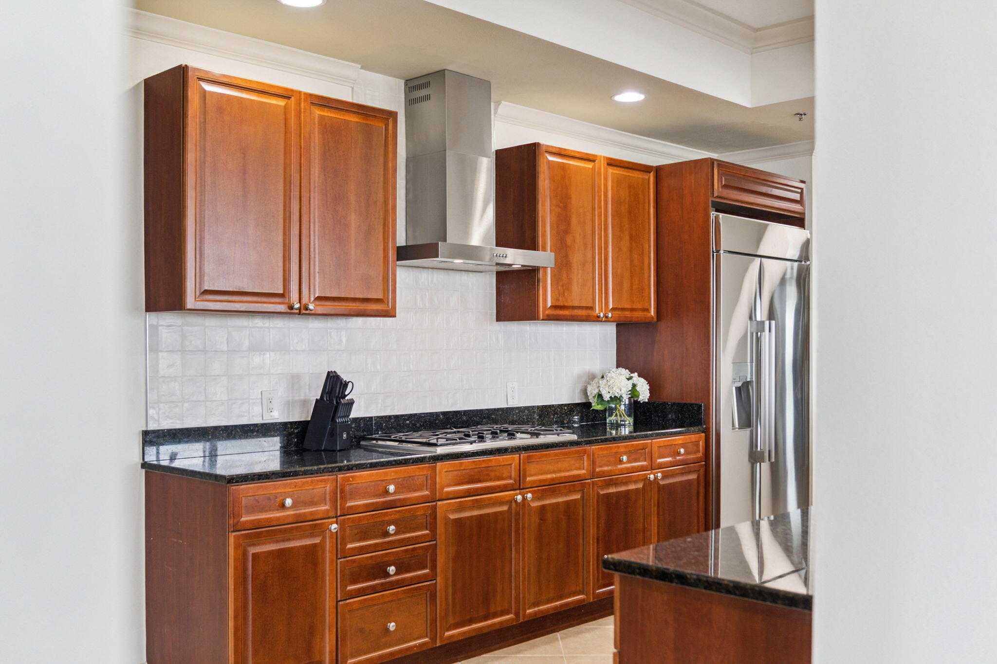 725 Gulf Shore Drive, Unit 902A Destin, FL 32541 - Photo 20 of 102 a kitchen with stainless steel appliances granite countertop a refrigerator and a sink