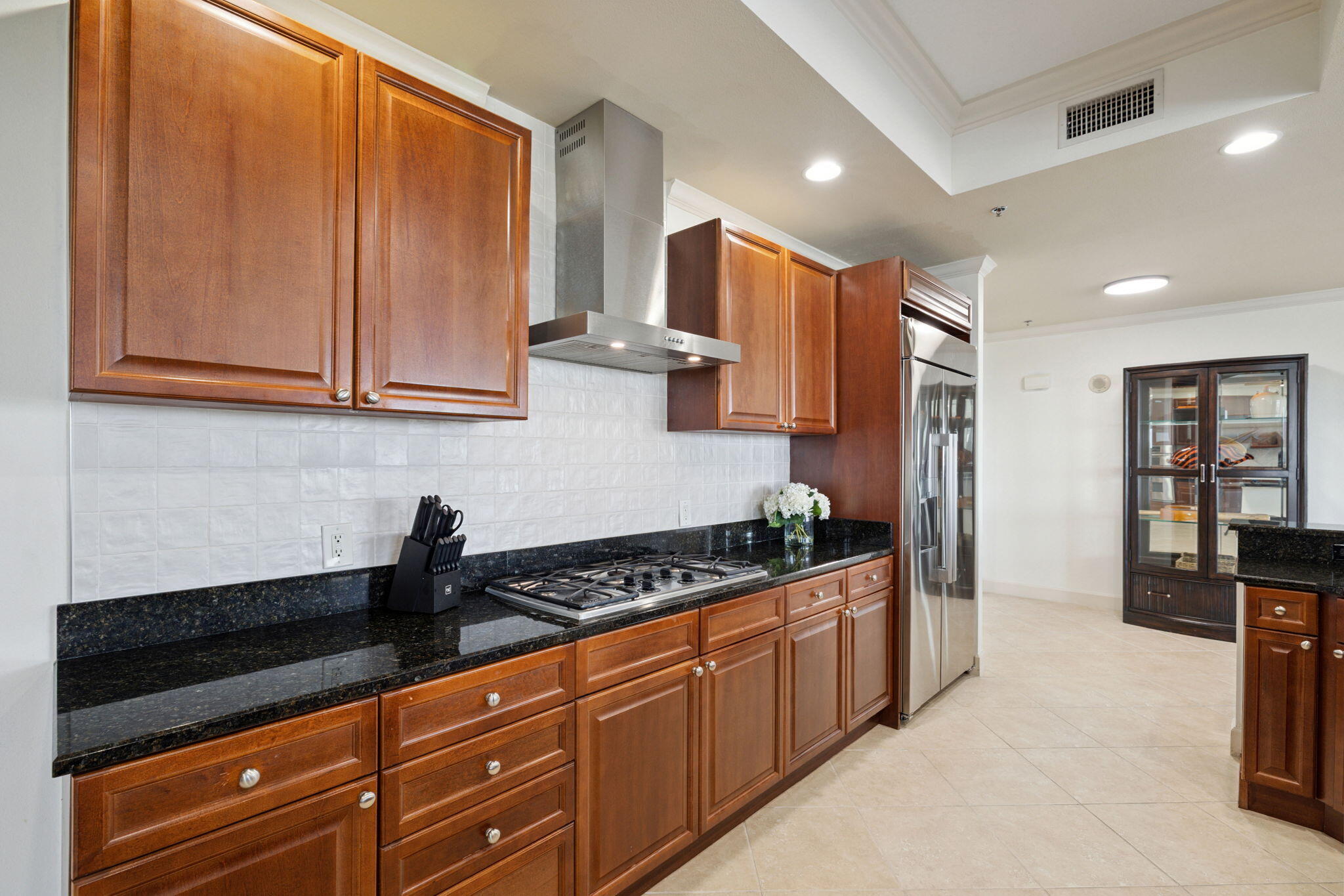 725 Gulf Shore Drive, Unit 902A Destin, FL 32541 - Photo 21 of 102 a kitchen with stainless steel appliances granite countertop a stove a sink and a refrigerator
