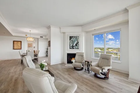 a view of a lake with a city from a balcony