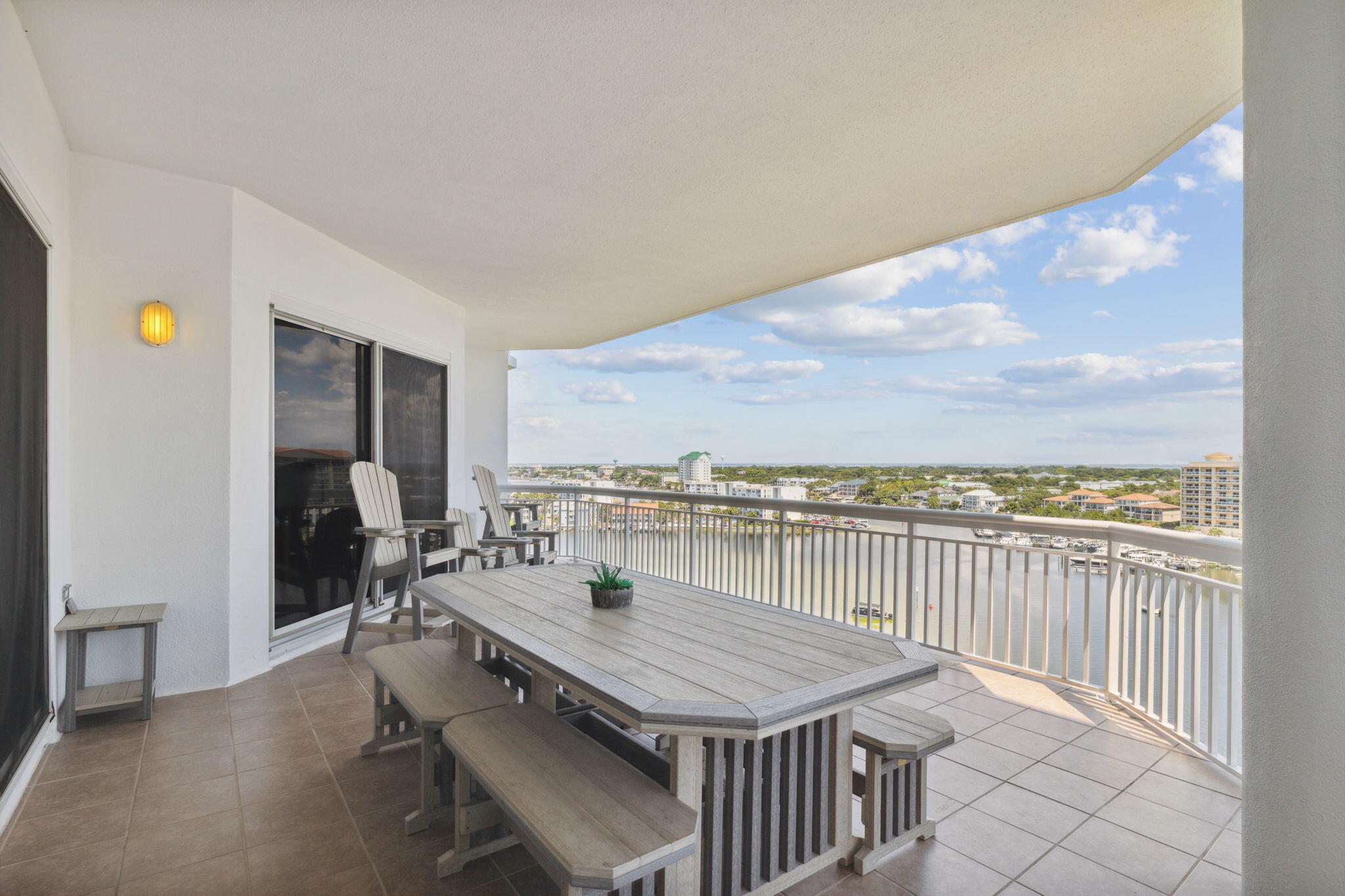 725 Gulf Shore Drive, Unit 902A Destin, FL 32541 - Photo 38 of 102 a dining room with furniture and a floor to ceiling window