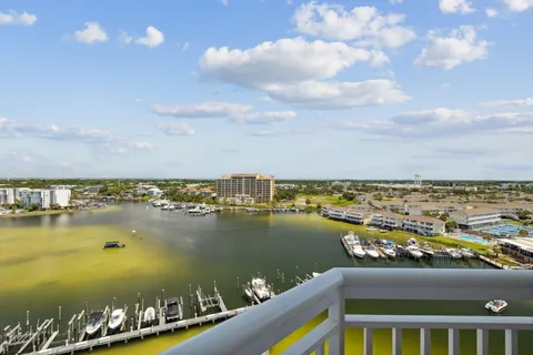 an aerial view of a city with ocean view