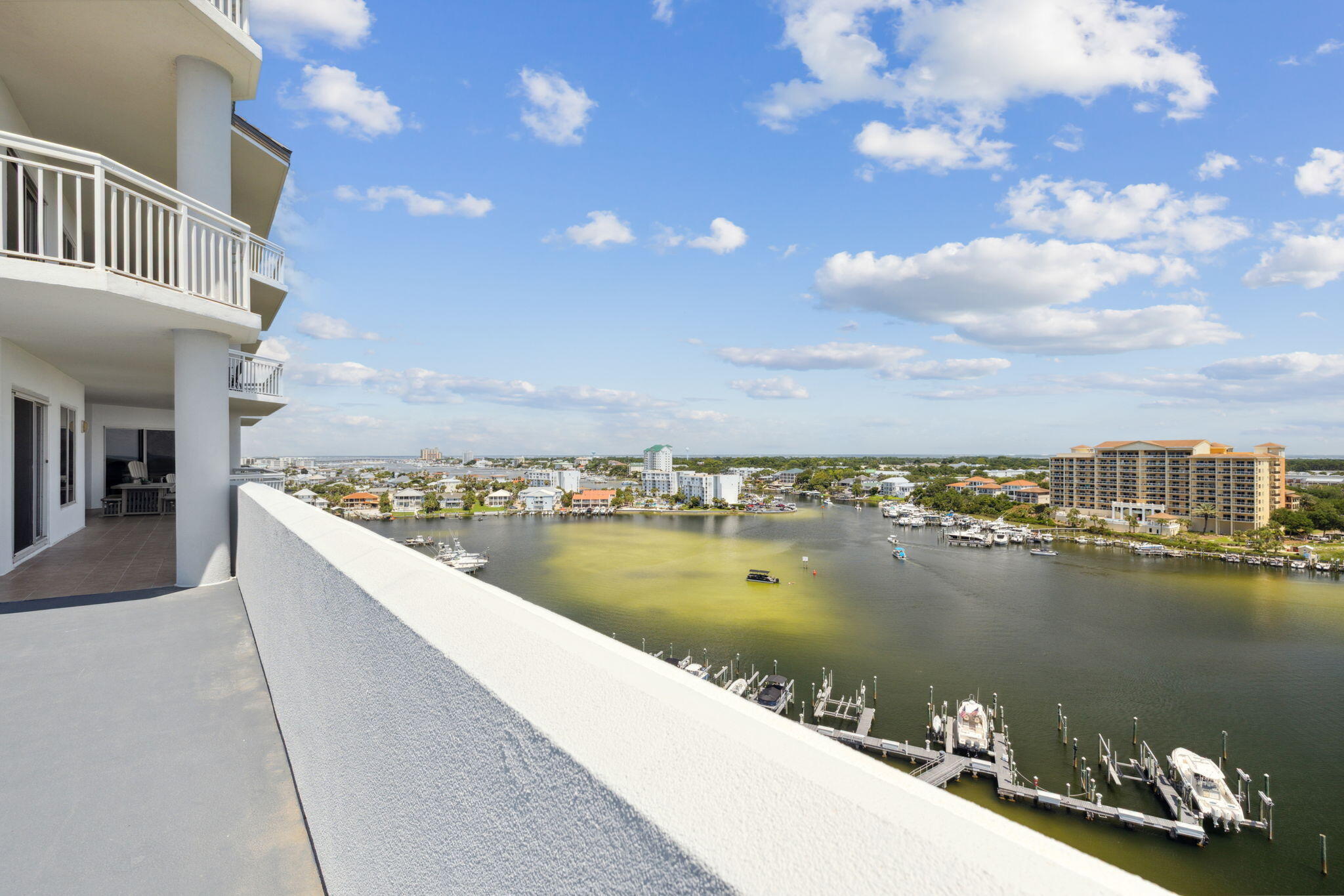 725 Gulf Shore Drive, Unit 902A Destin, FL 32541 - Photo 54 of 102 a view of a lake with a city from a balcony