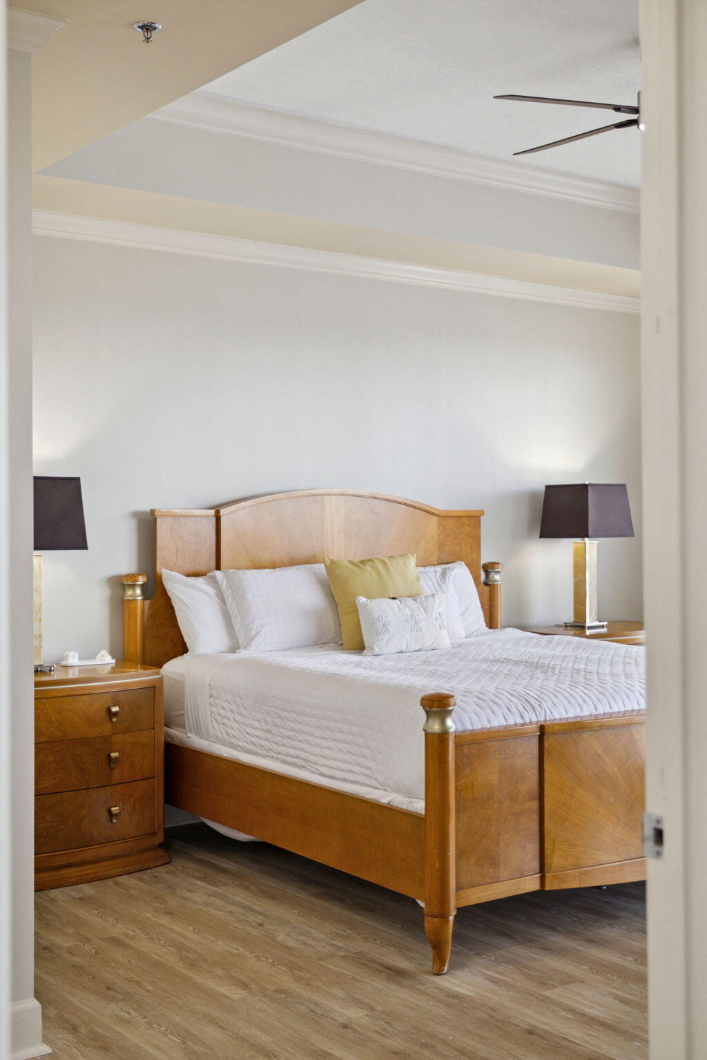 725 Gulf Shore Drive, Unit 902A Destin, FL 32541 - Photo 56 of 102 a bedroom with a bed and wooden floor